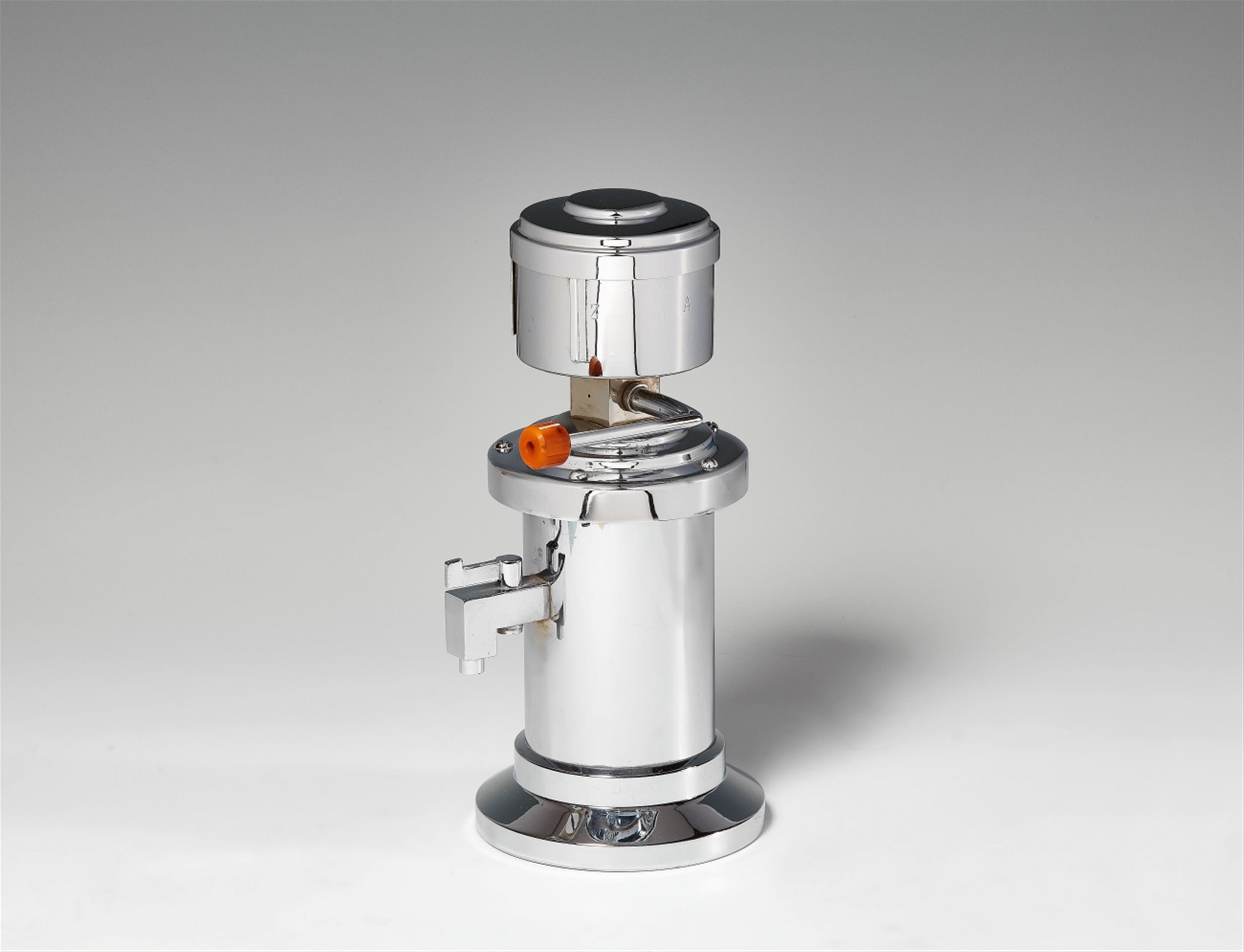 A Bauhaus style chrome-plated espresso machine - image-1