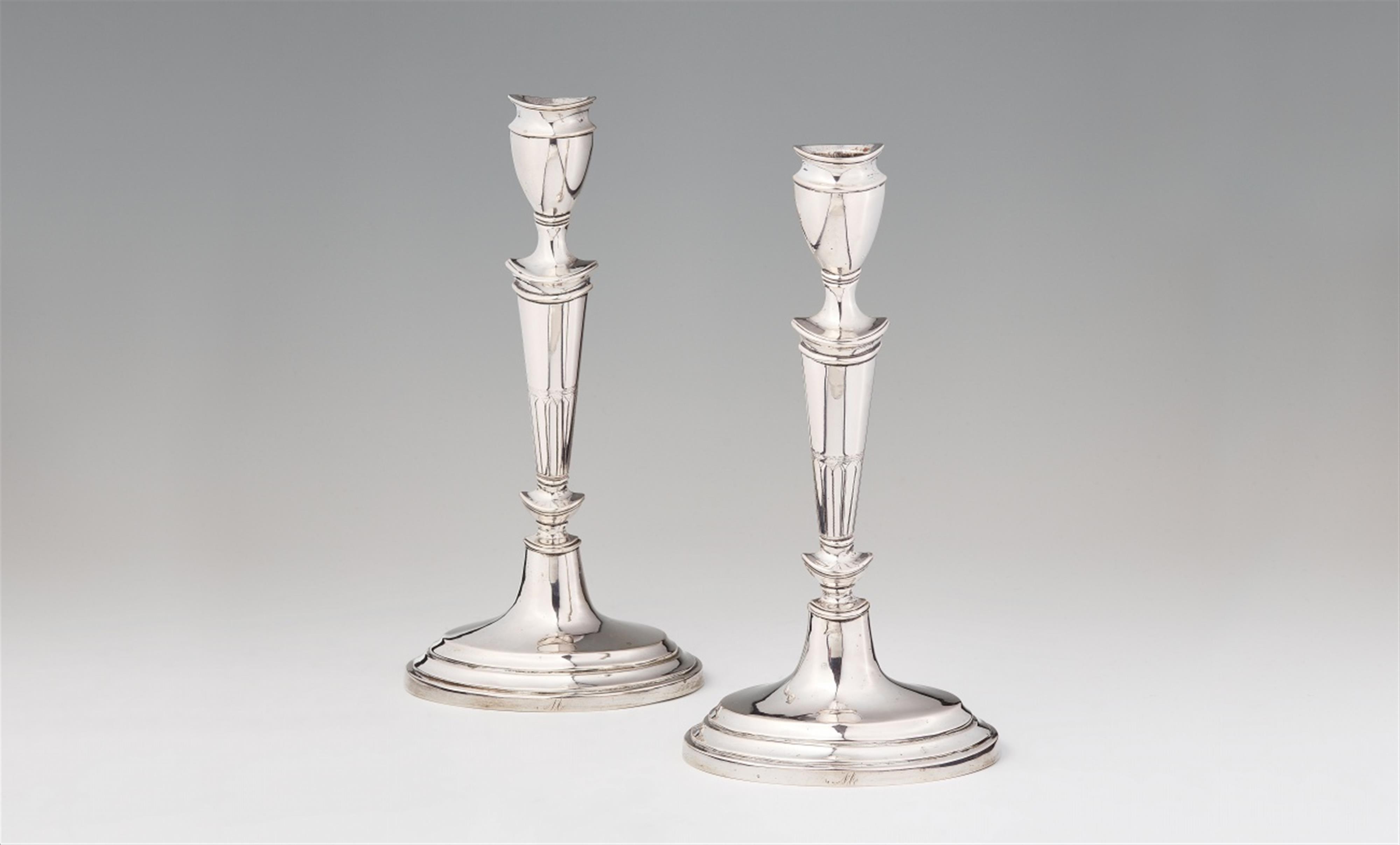 A pair of Hamburg silver candlesticks - image-1