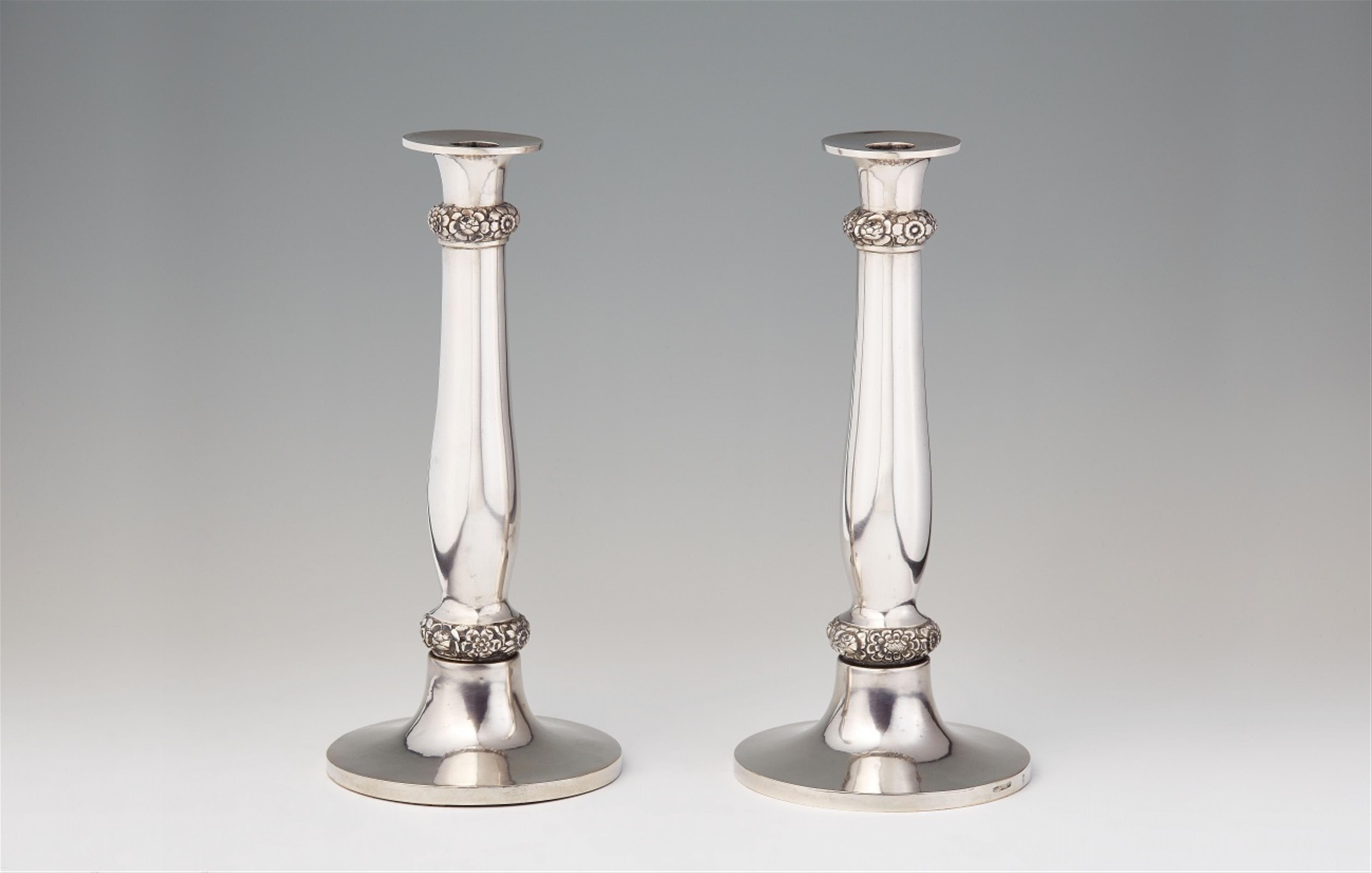 A pair of Biedermeier silver candlesticks - image-1