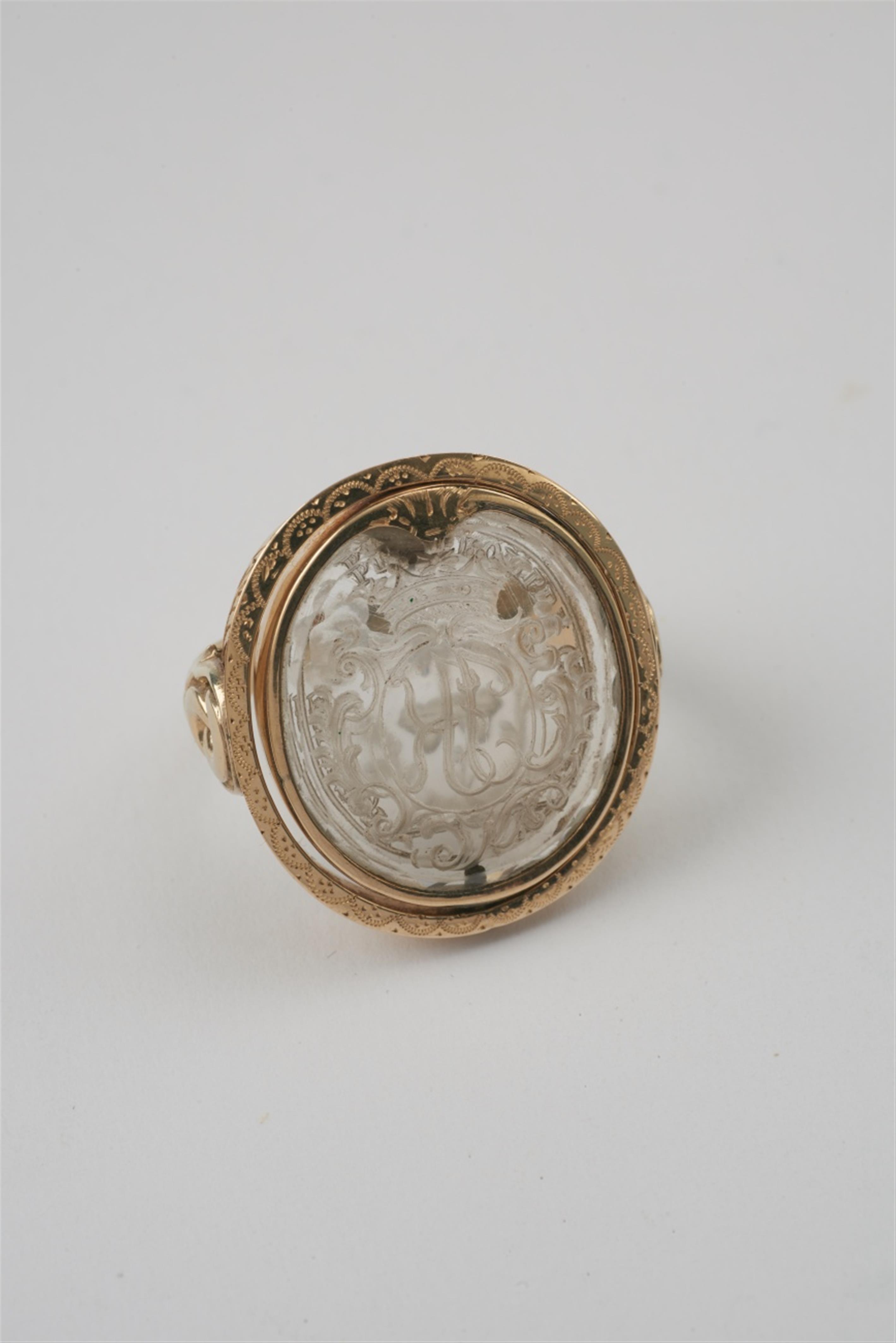 A German 14k gold and rock crystal swivel ring - image-1