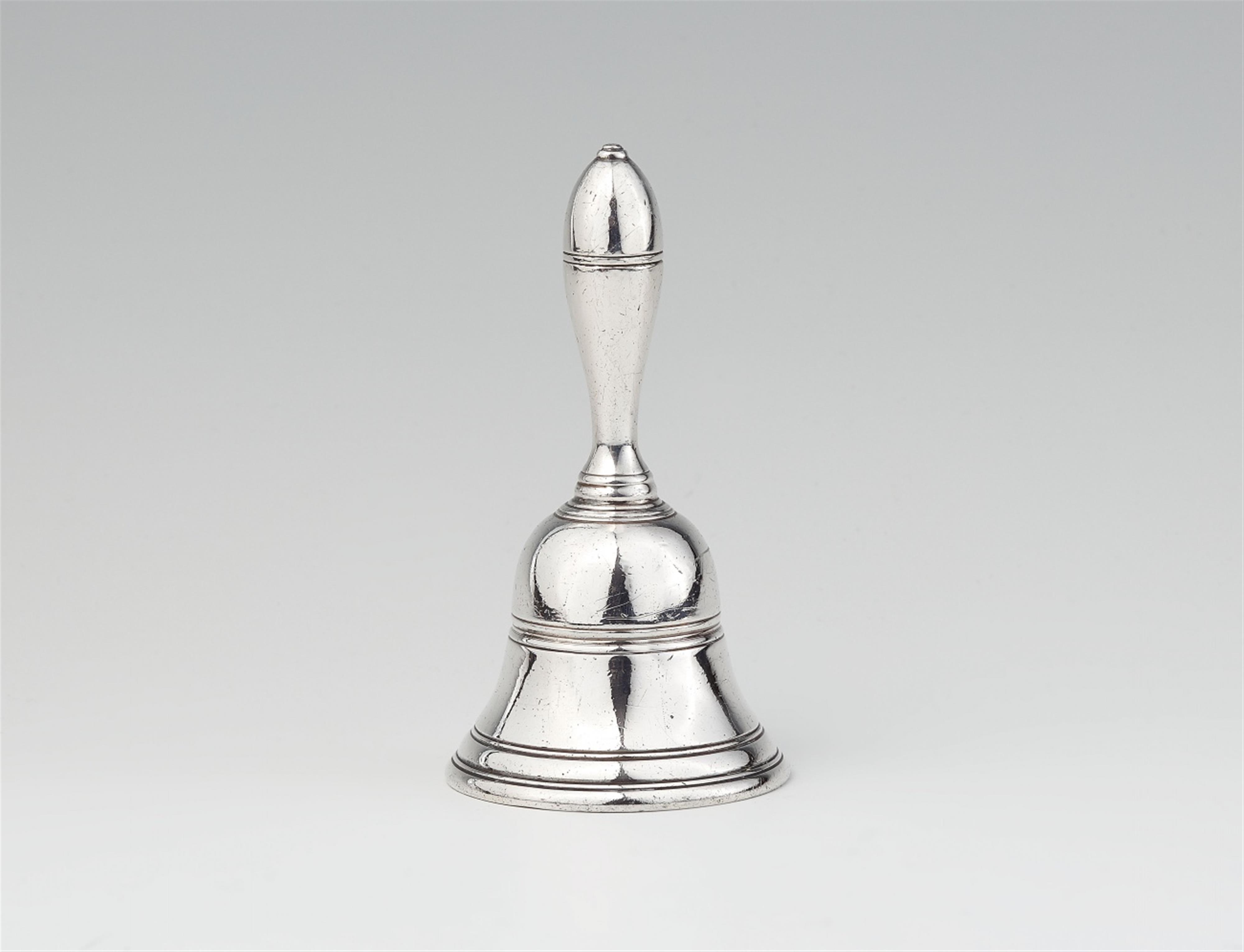 A Georgian silver table bell - image-1