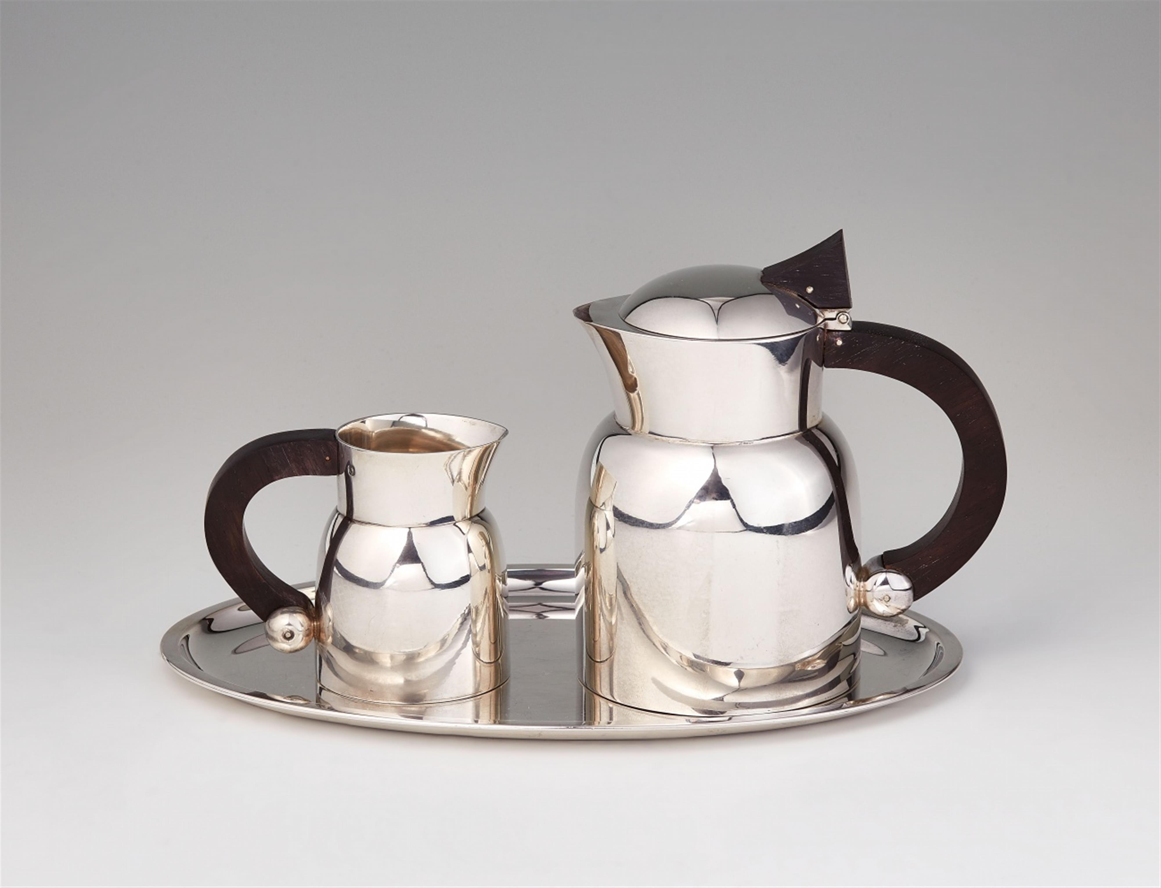 A Puiforcat silver mocca pot and cream jug - image-1