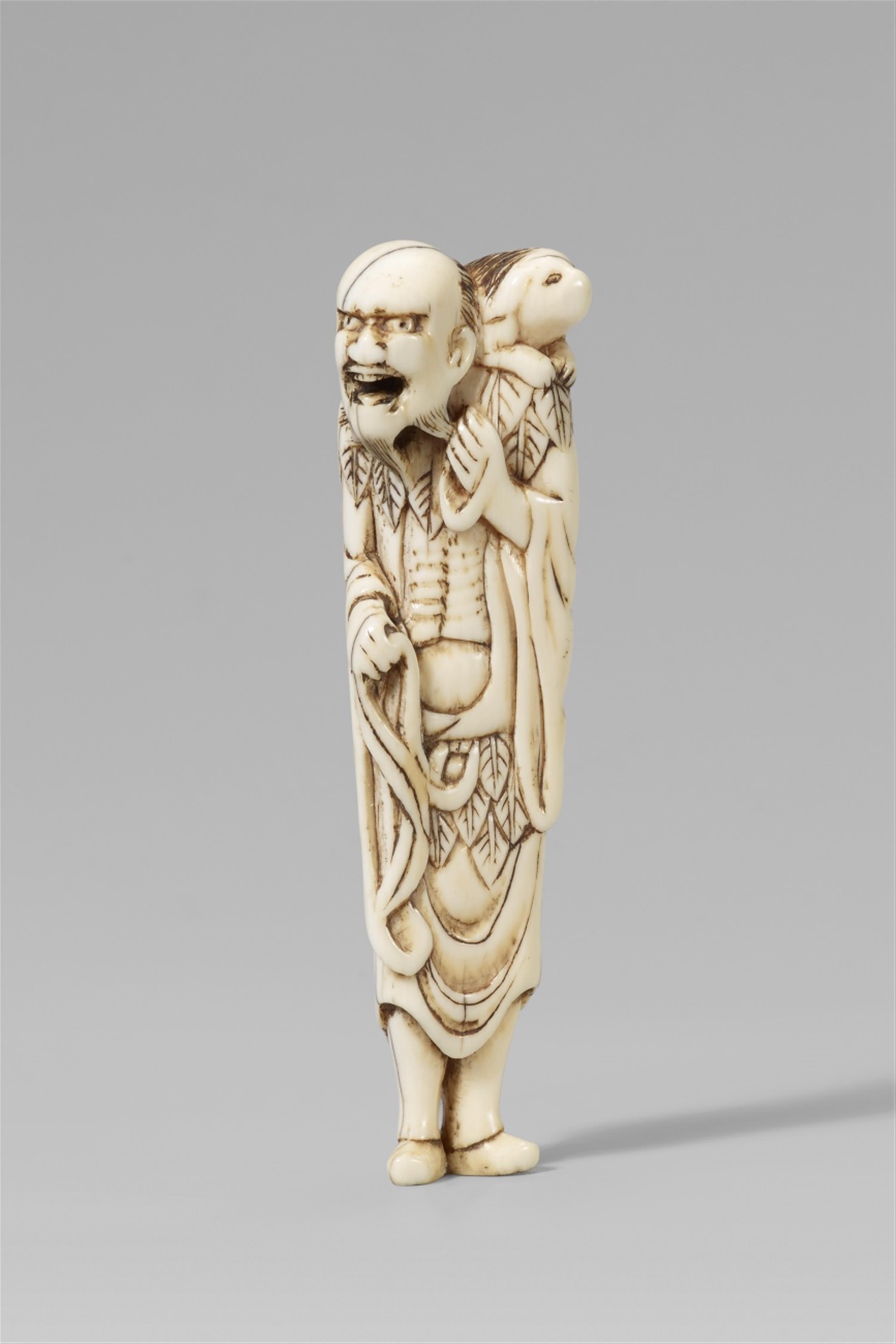 An ivory netsuke of a sennin with a long-haired dog. 18th century - image-1