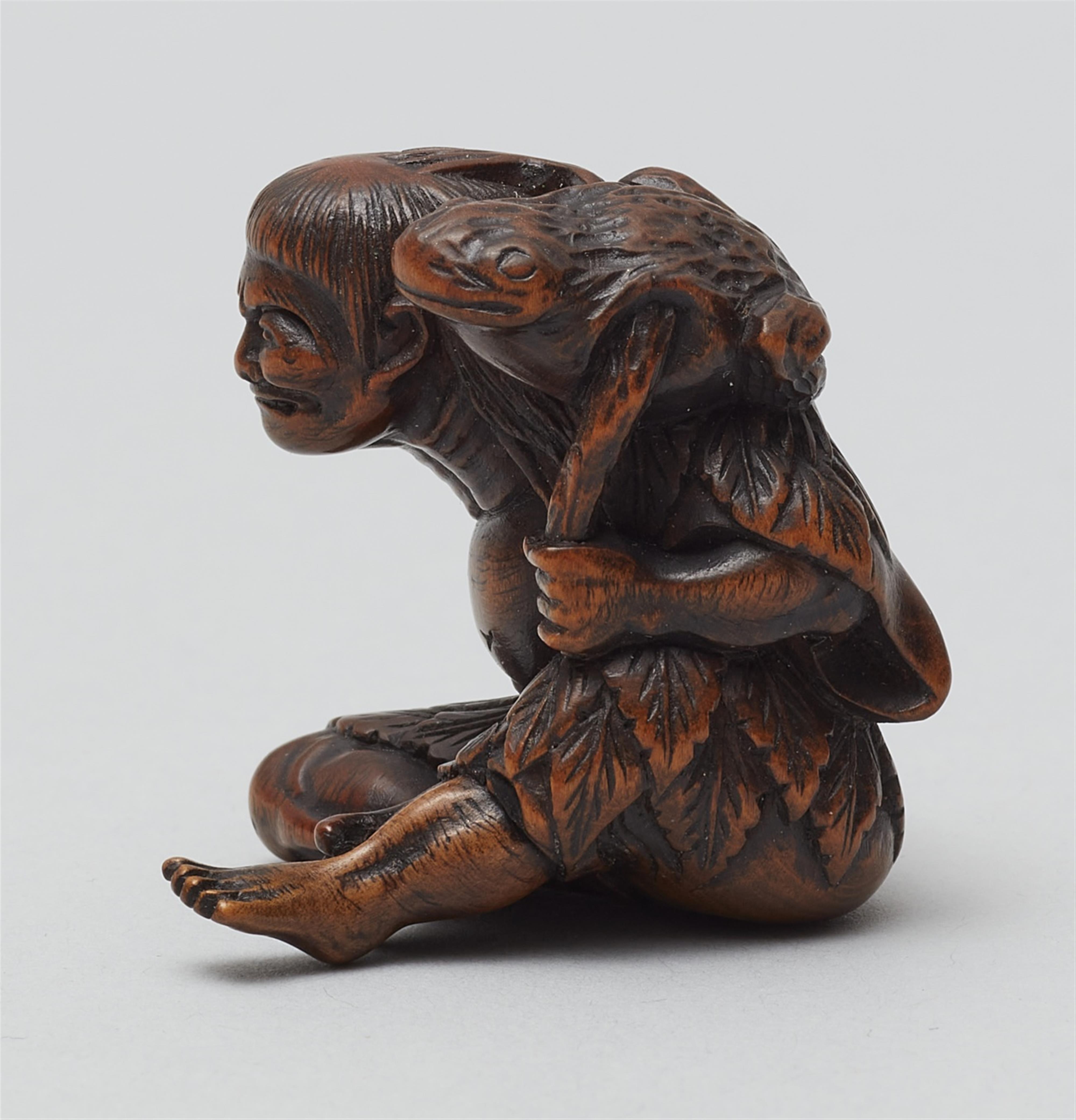 A boxwood netsuke of a grumpy Gama Sennin. Mid-19th century - image-2