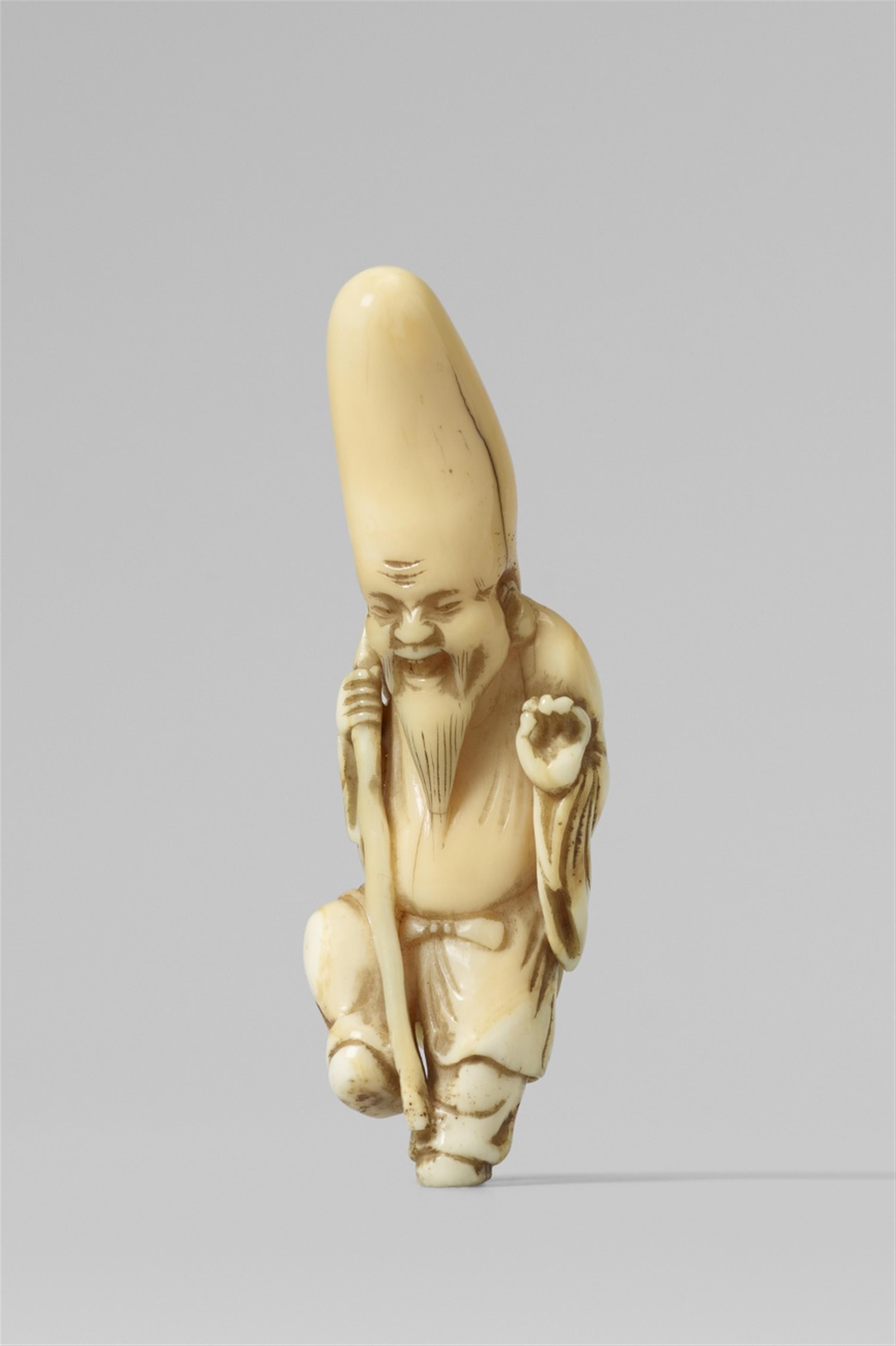 A marine ivory sperm whale tooth netsuke of a happy-go-lucky Fukurokuju. 19th century - image-1