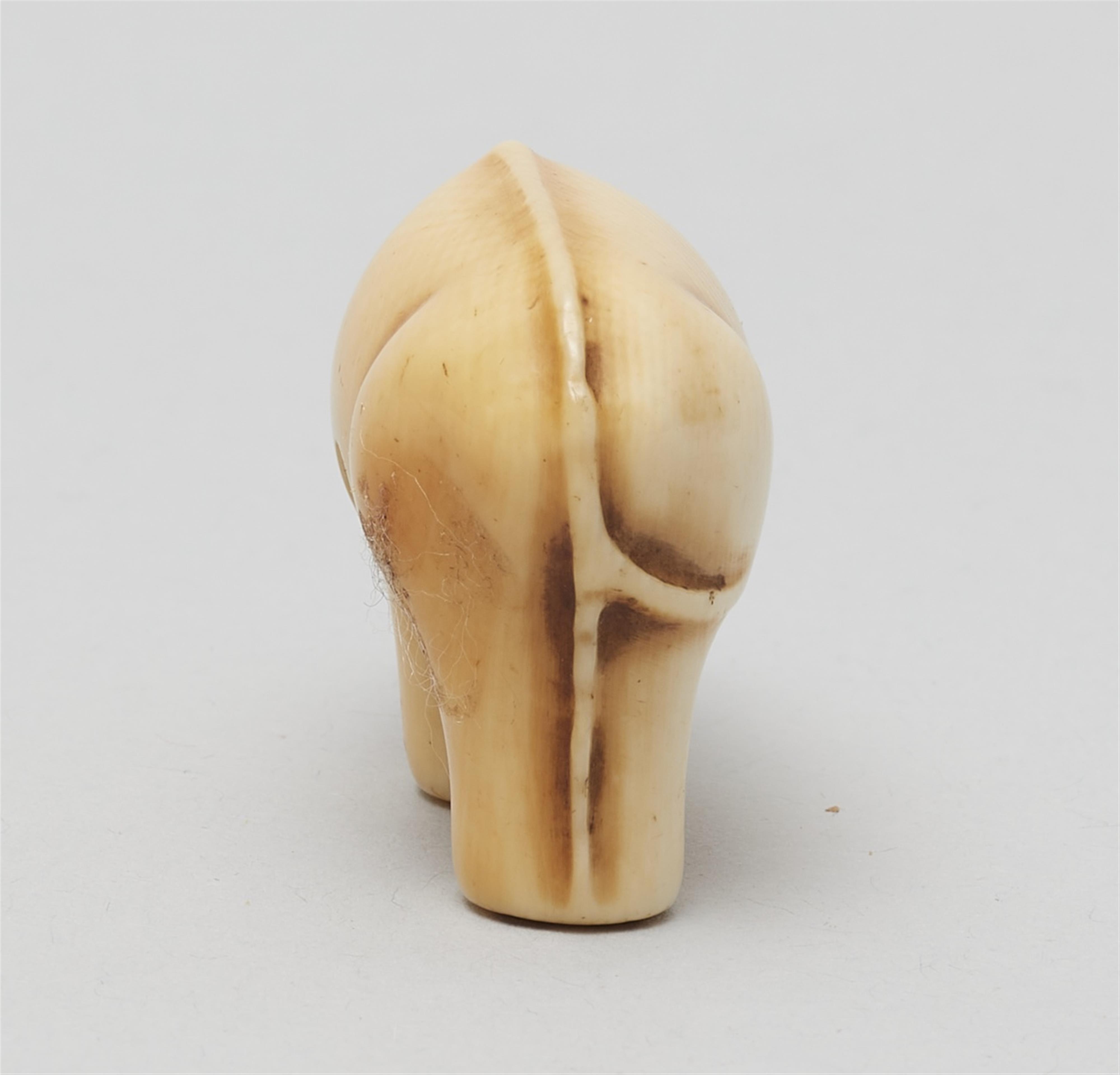 An Osaka school ivory netsuke of a toy figurine of an ox. Mid-19th century - image-3