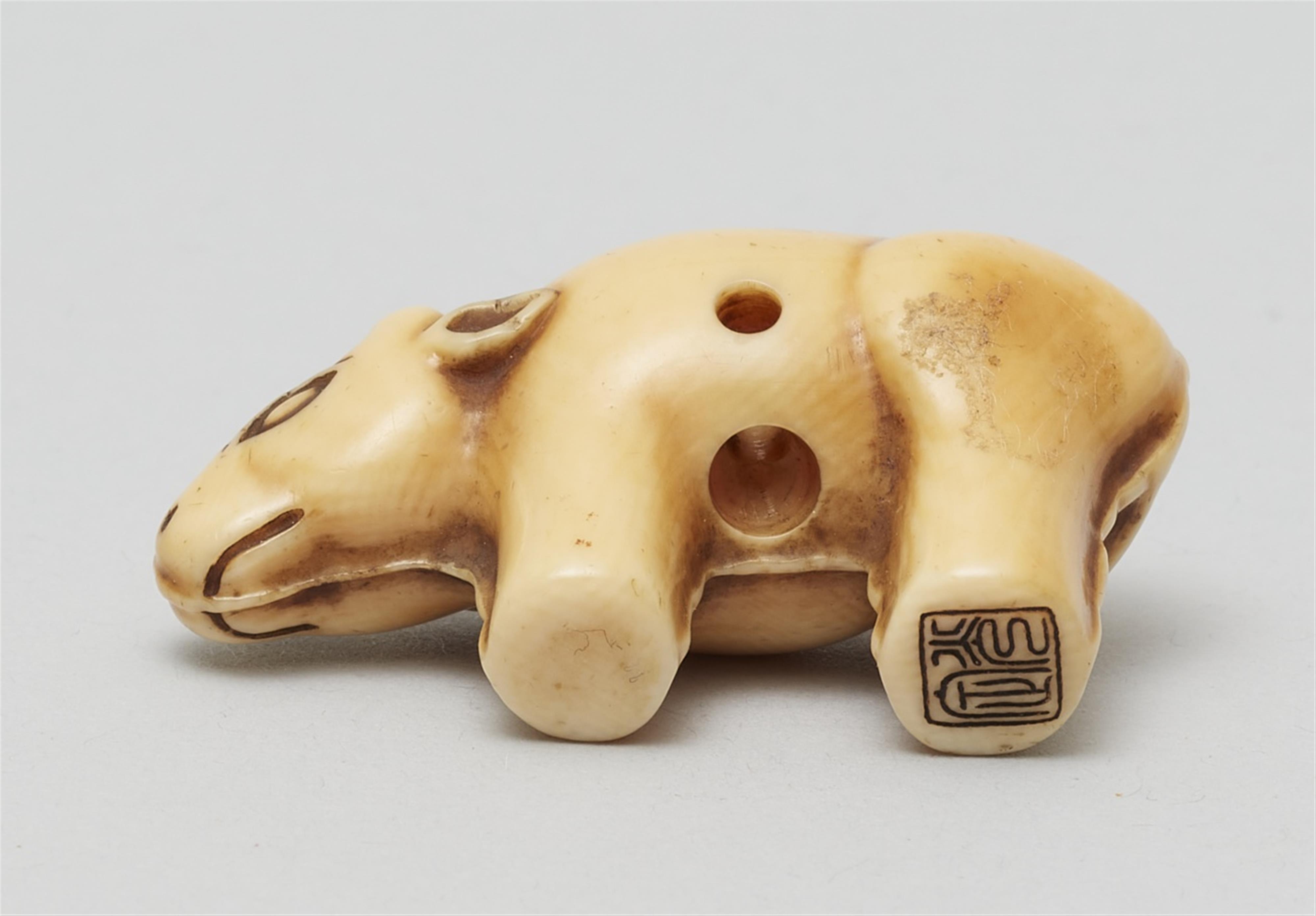 An Osaka school ivory netsuke of a toy figurine of an ox. Mid-19th century - image-4