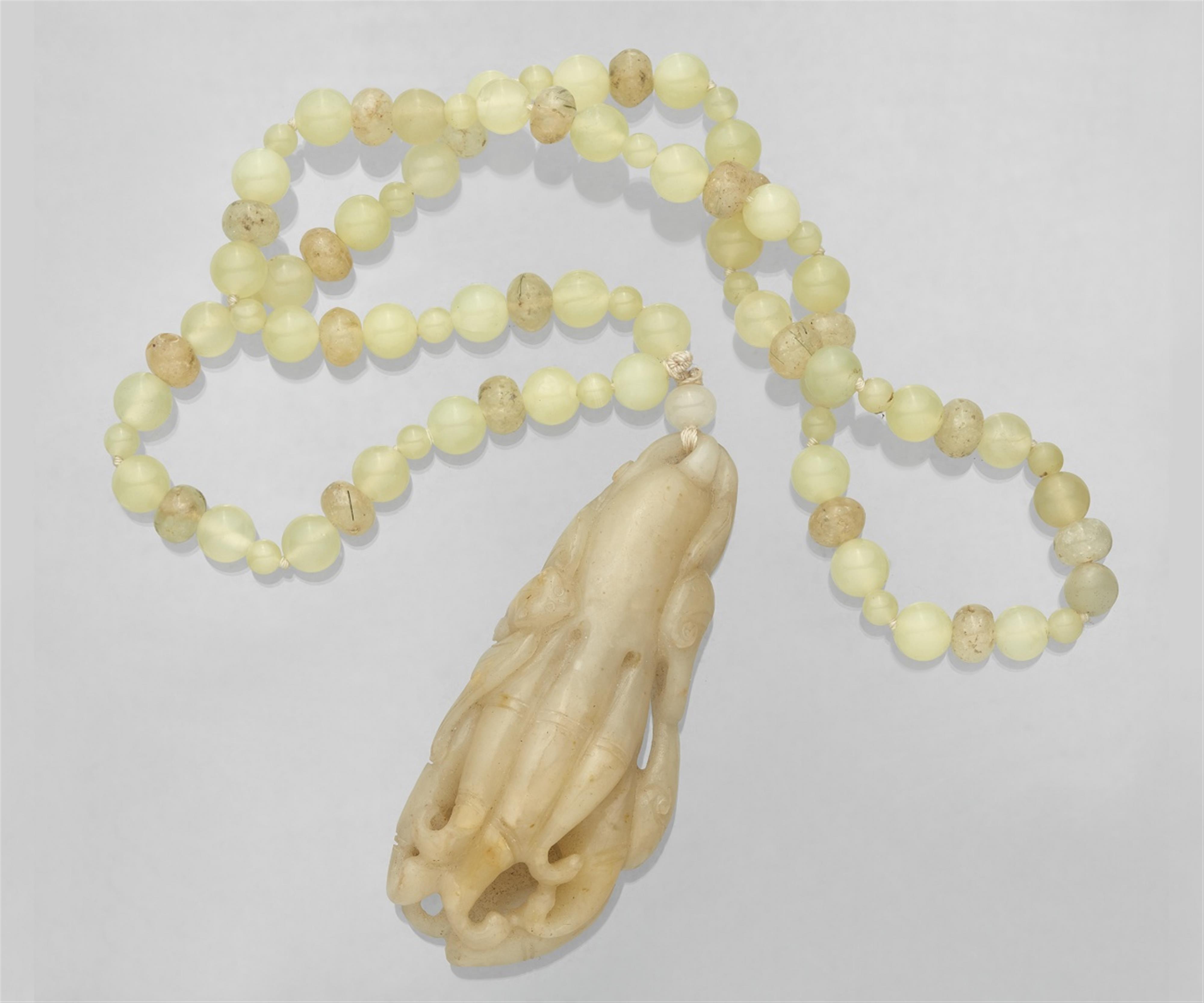 A large light-coloured jade pendant. 19th century - image-1