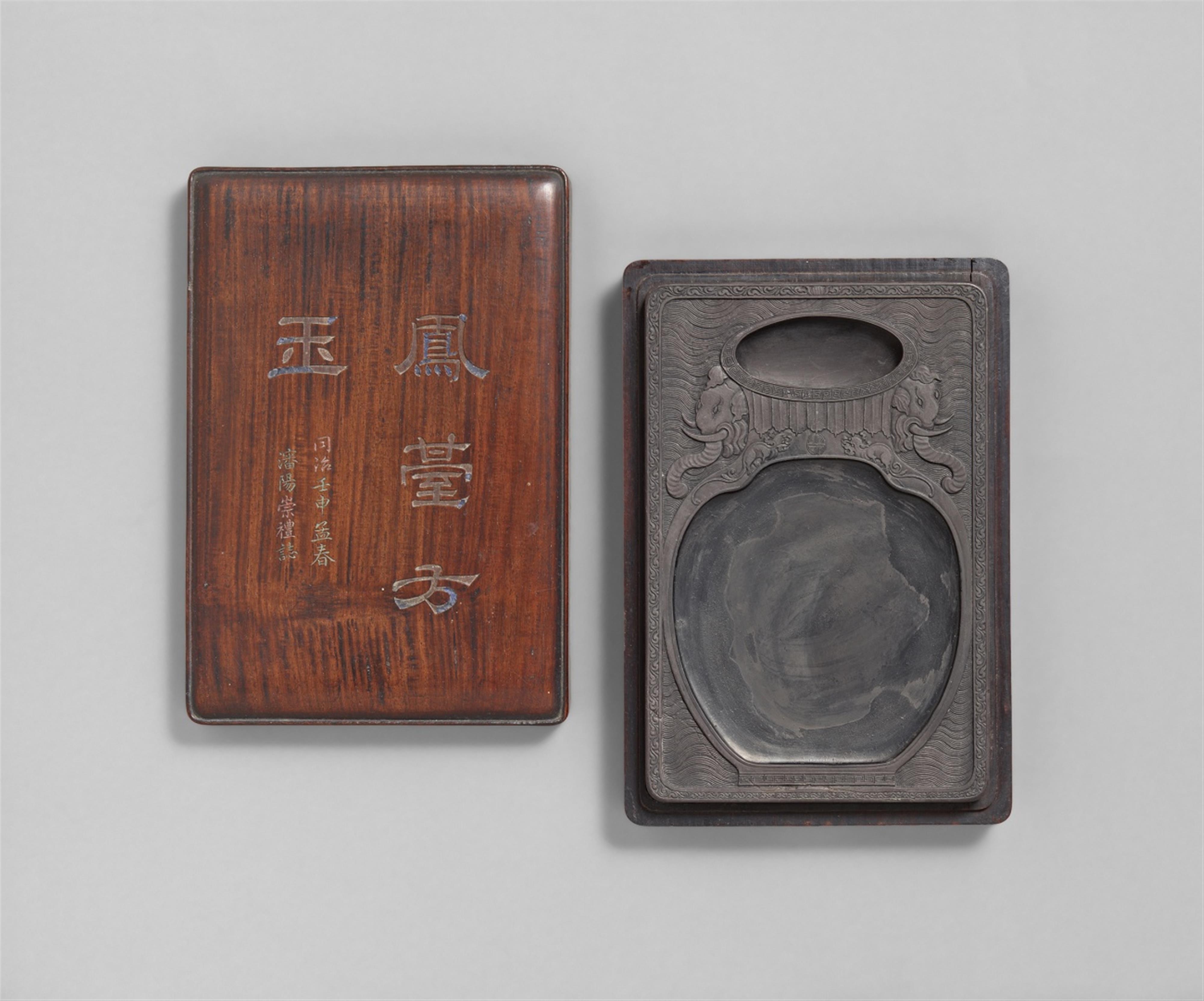 An inkstone in a fitted wooden box - image-1