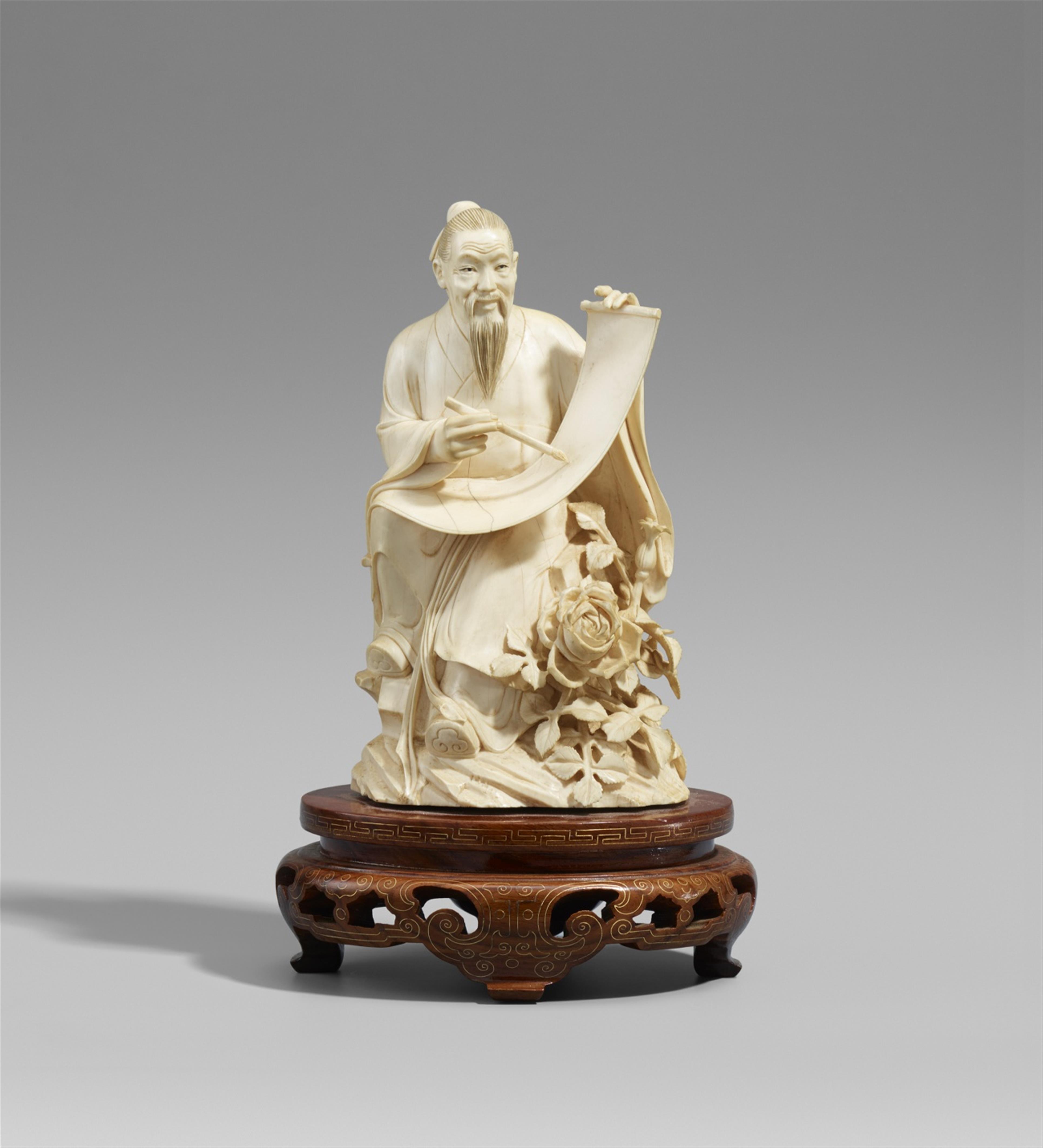 An ivory figure of a writing scholar. First half 20th century - image-1