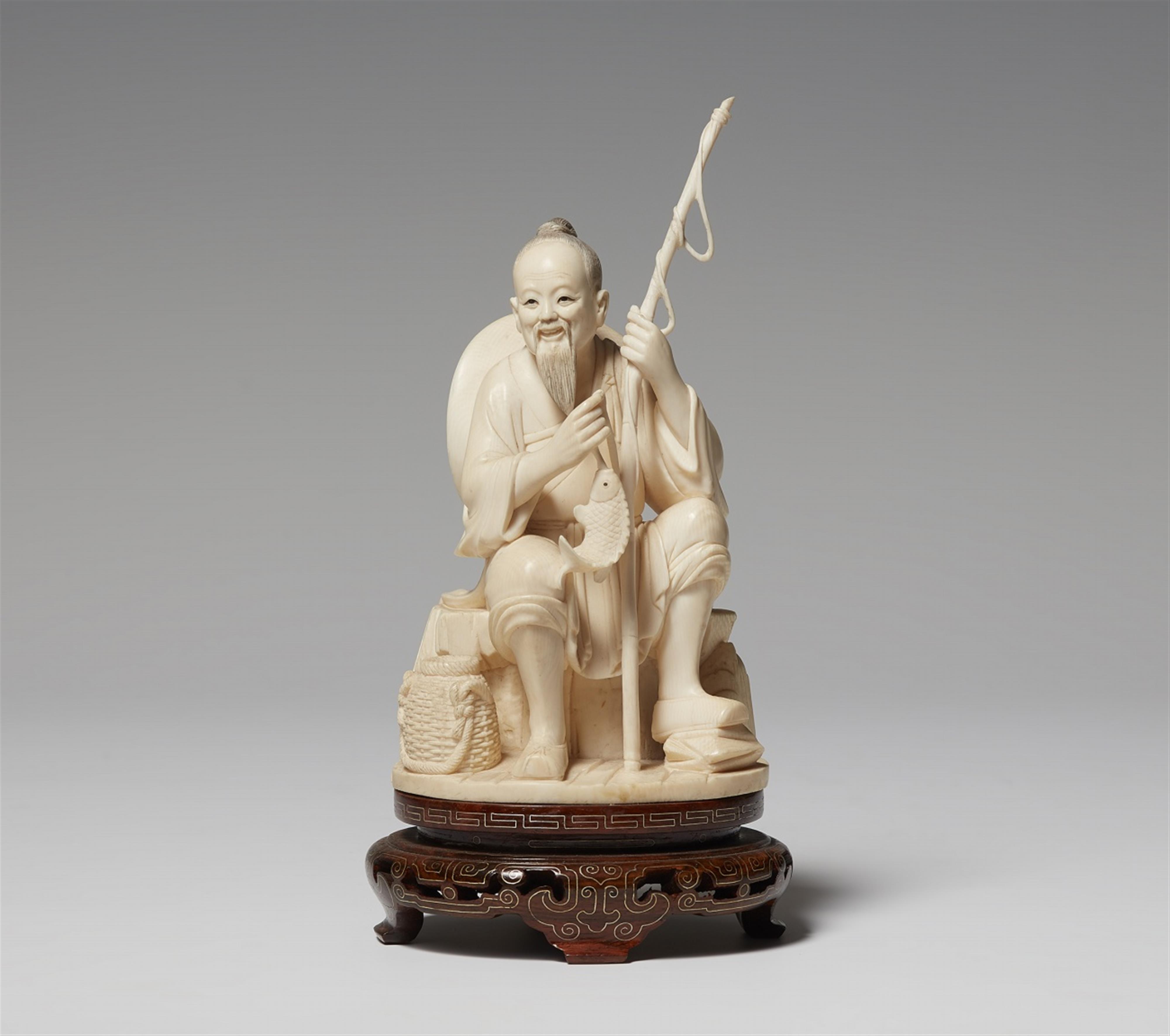 An ivory figure of a fisherman. Mid-20th century - image-1