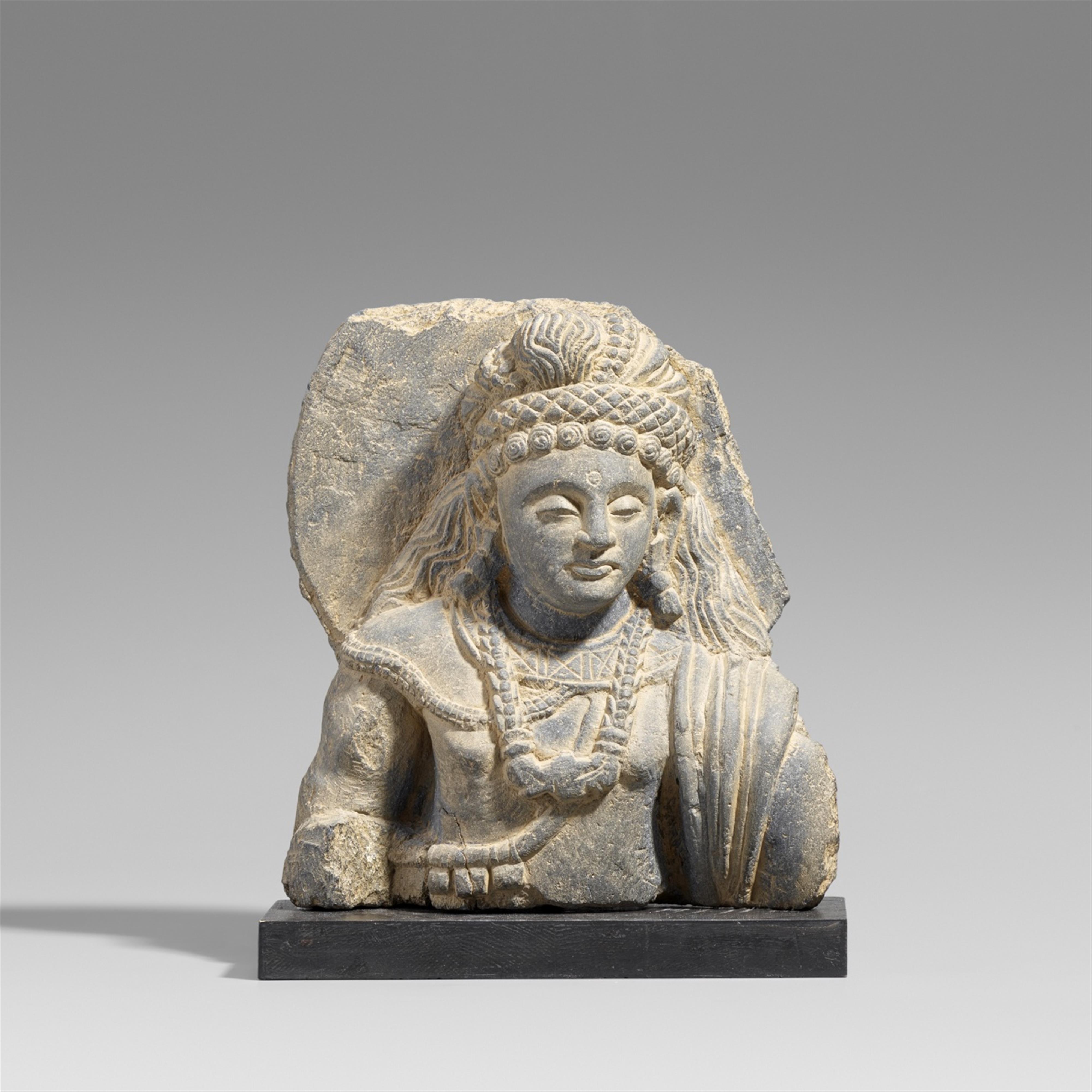 A Gandhara grey schist fragment of a Bodhisattva. Pakistan. 2nd/3rd century - image-1