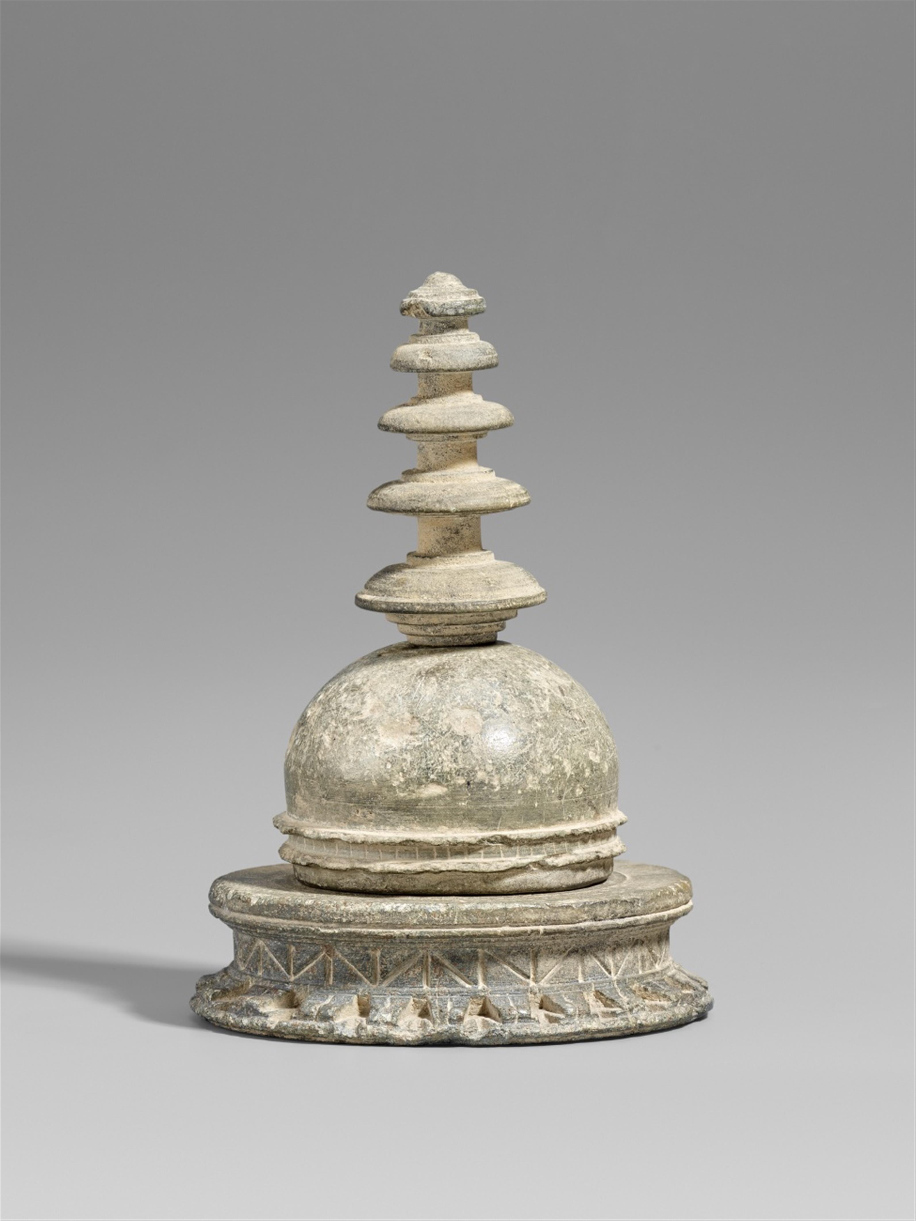 A Gandhara greenish grey schist reliquiary in shape of a stupa. 2nd/3rd century - image-1