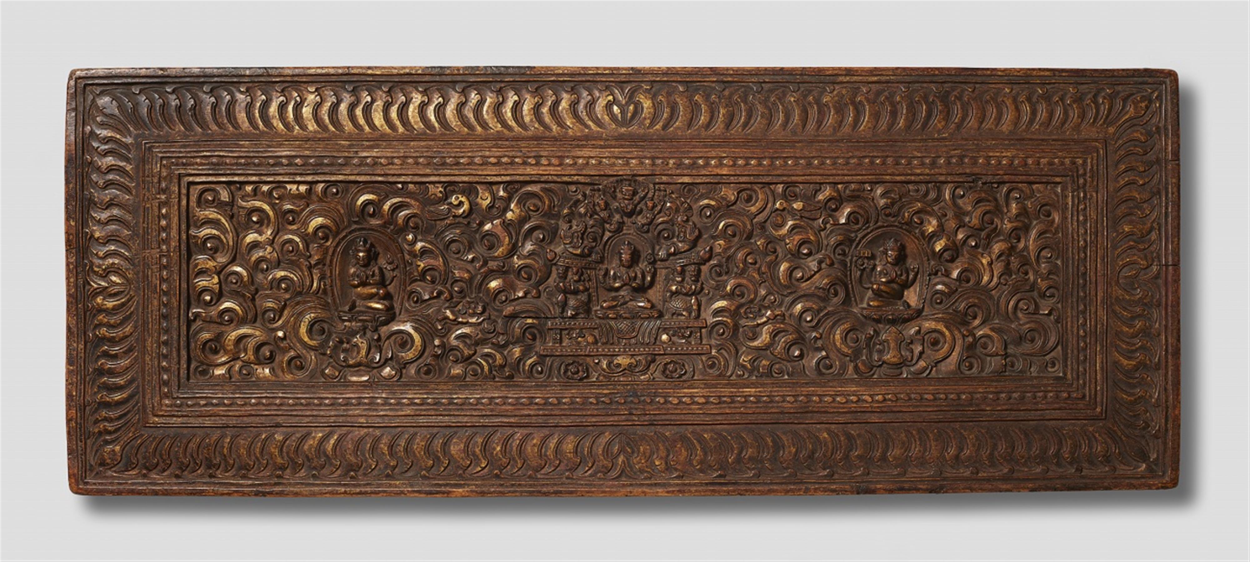 A Tibetan gilt wood manuscript cover. 17th/18th century - image-1