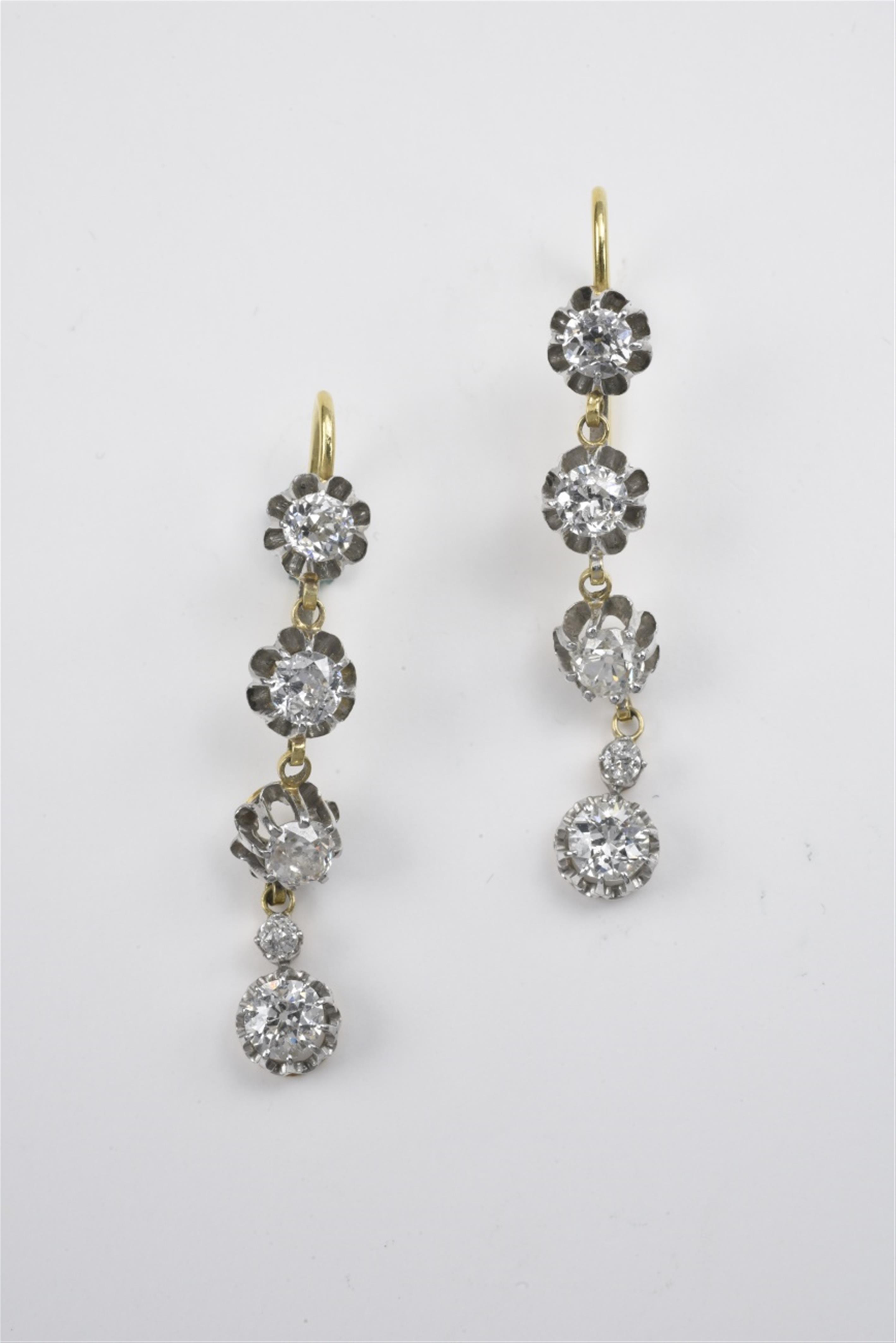 A pair of gold and diamond earrings - image-1