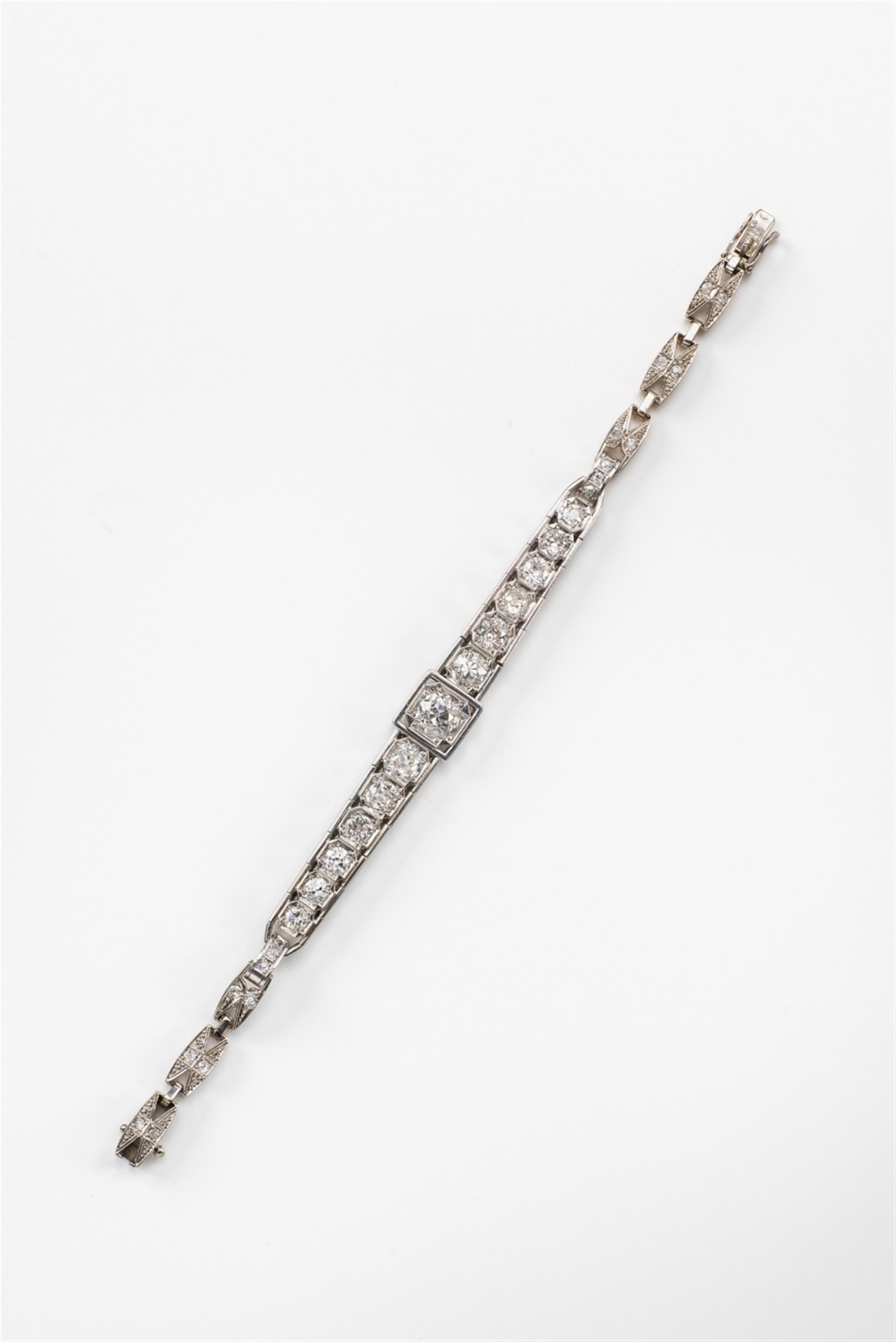 An Art Deco 18k white gold and diamond bracelet - image-1