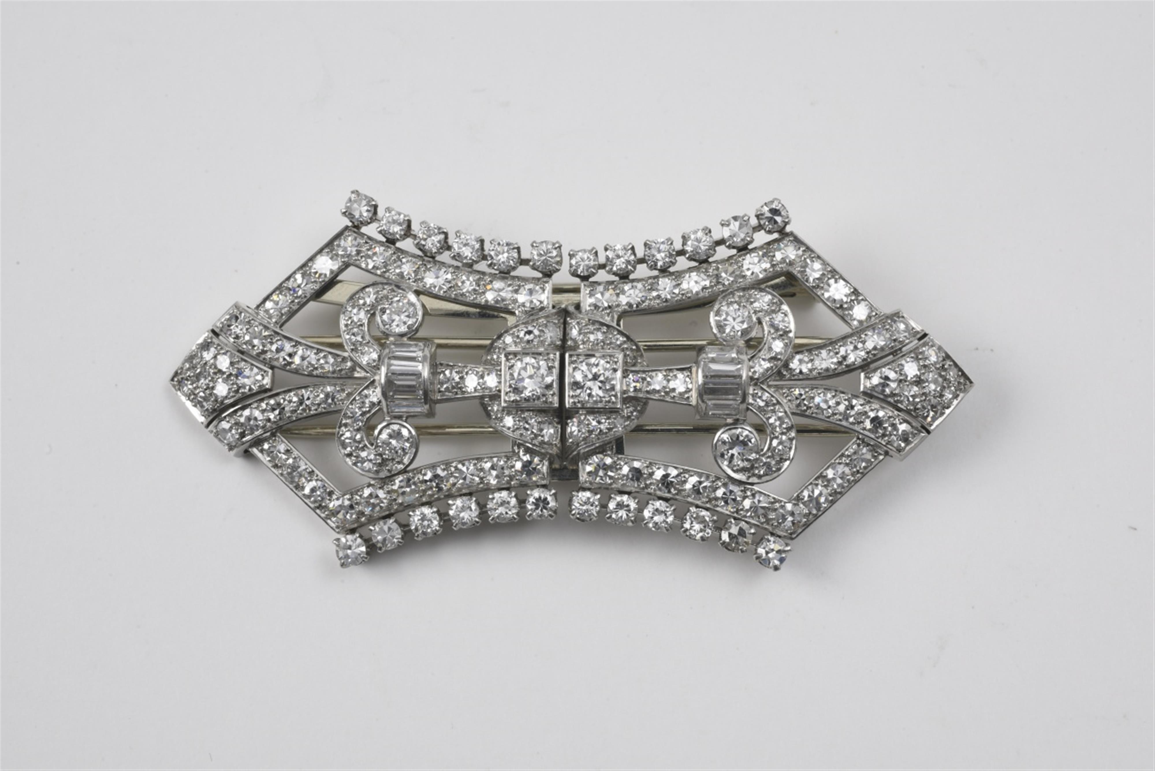 An Art Deco style 18k gold and diamond double clip brooch - image-1