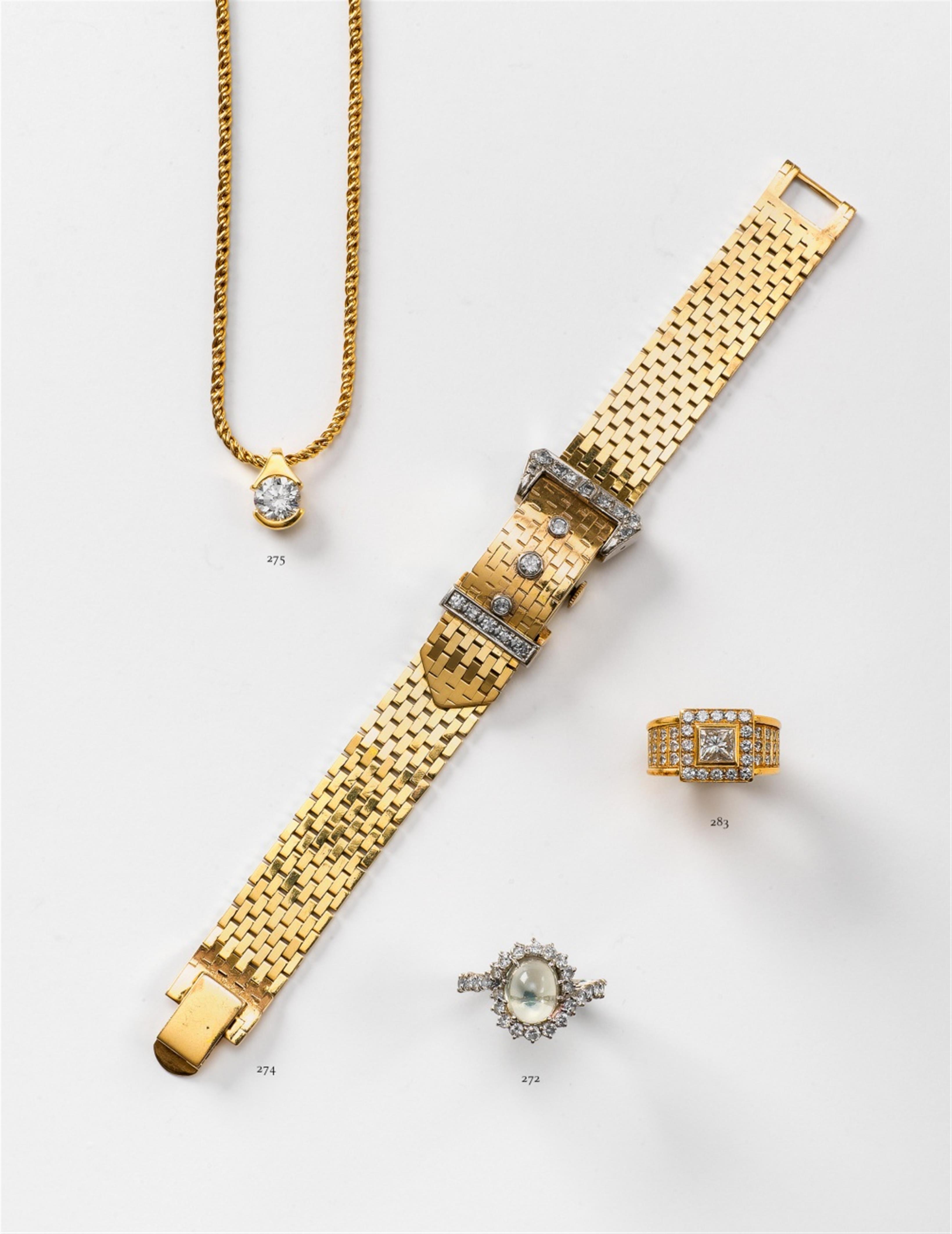 A 14k gold bracelet with a concealed watch - image-1