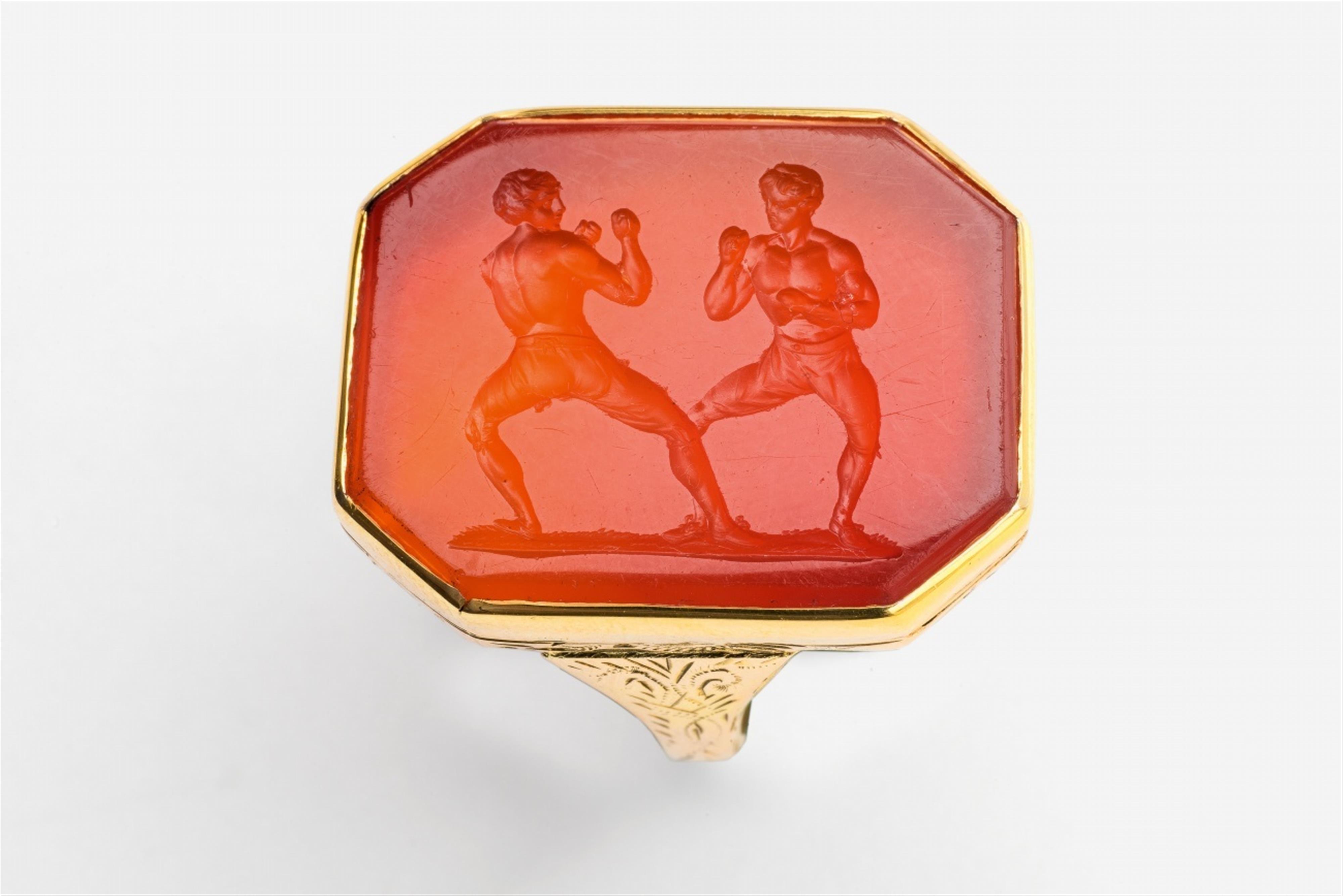 A 14k gold gentlemen's ring with a Neoclassical intaglio - image-1
