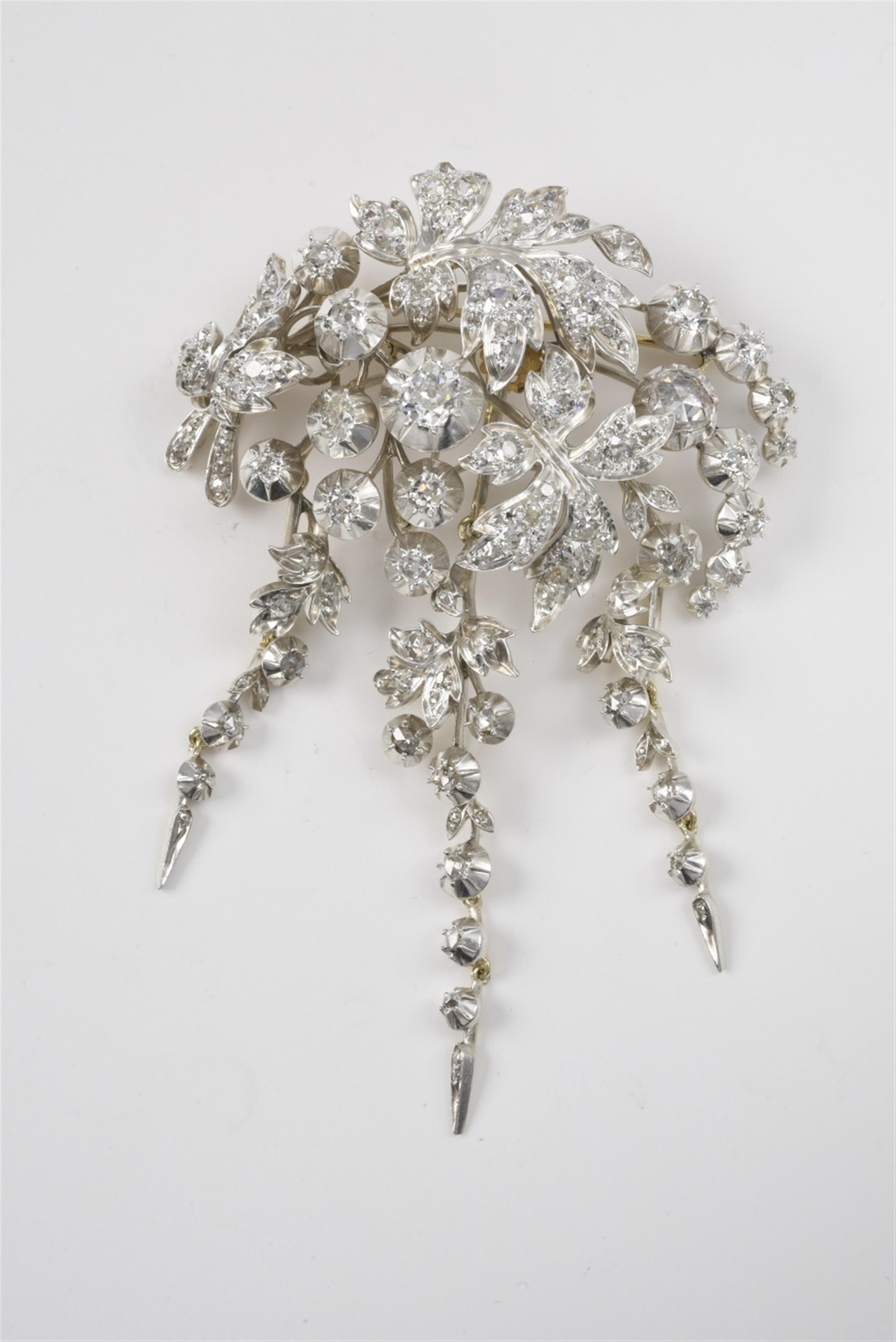 An 18k gold, silver and diamond corsage brooch - image-1