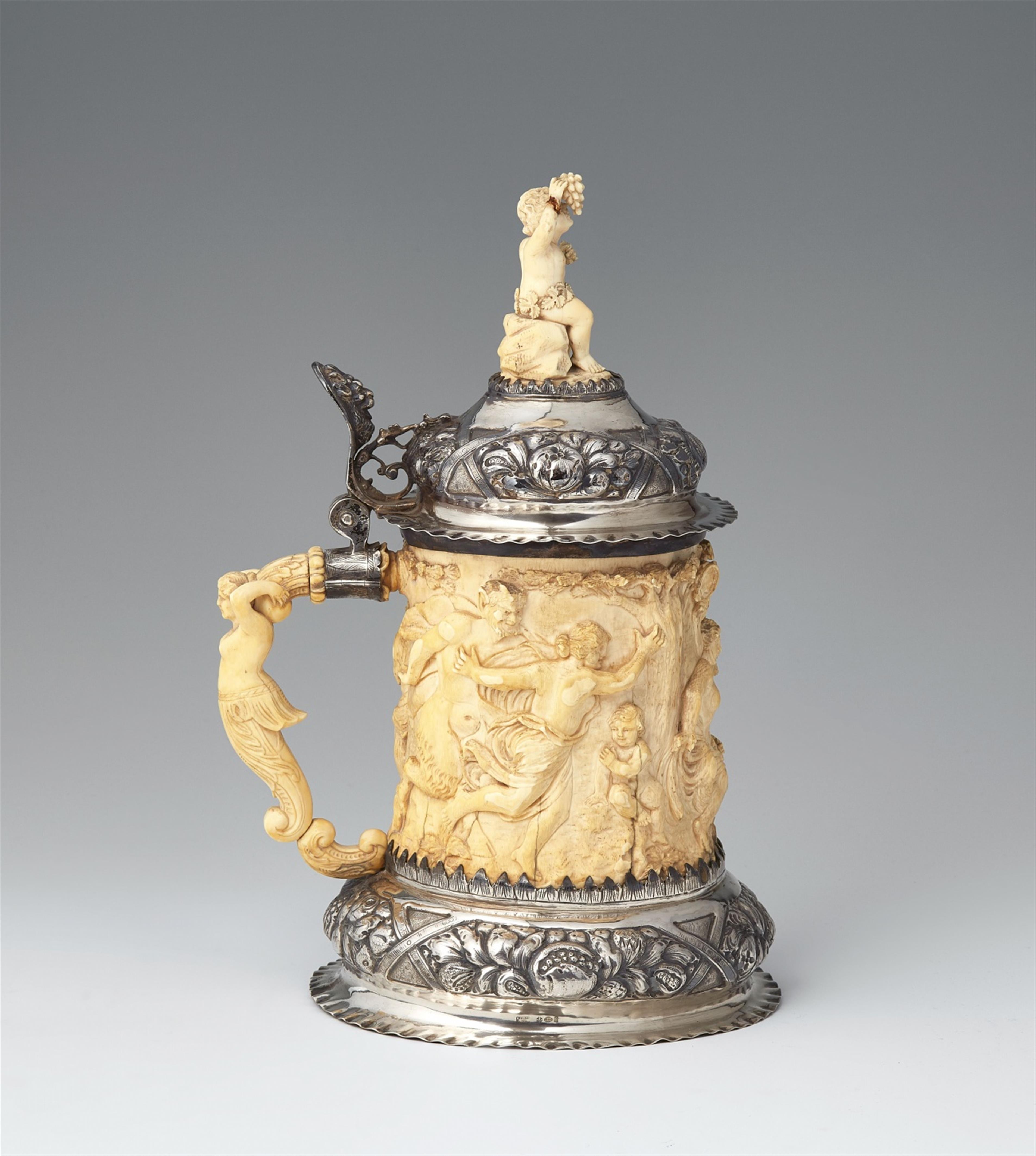 A silver-mounted ivory tankard with a faun and a nymph - image-1