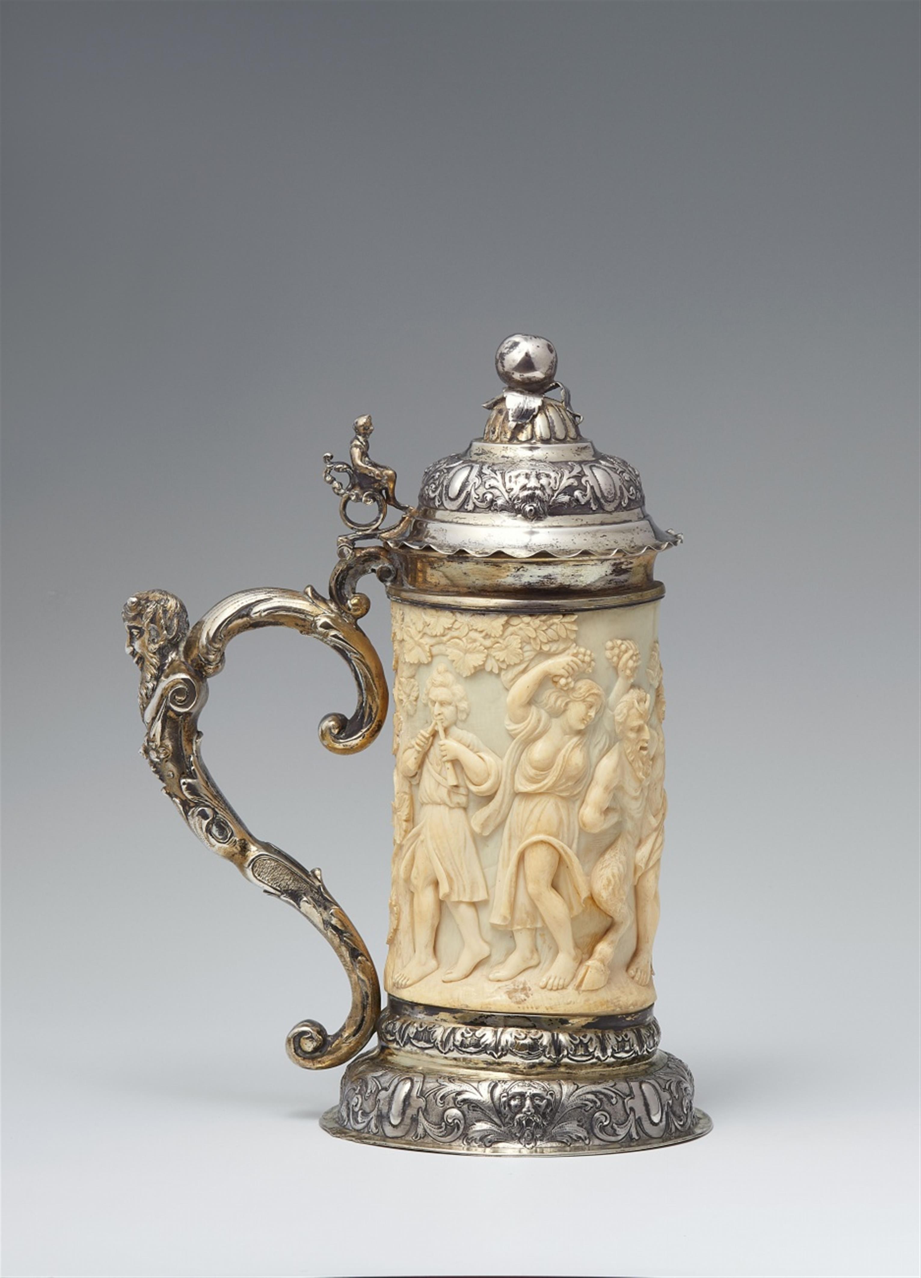 A German parcel gilt silver-mounted carved ivory tankard - image-3
