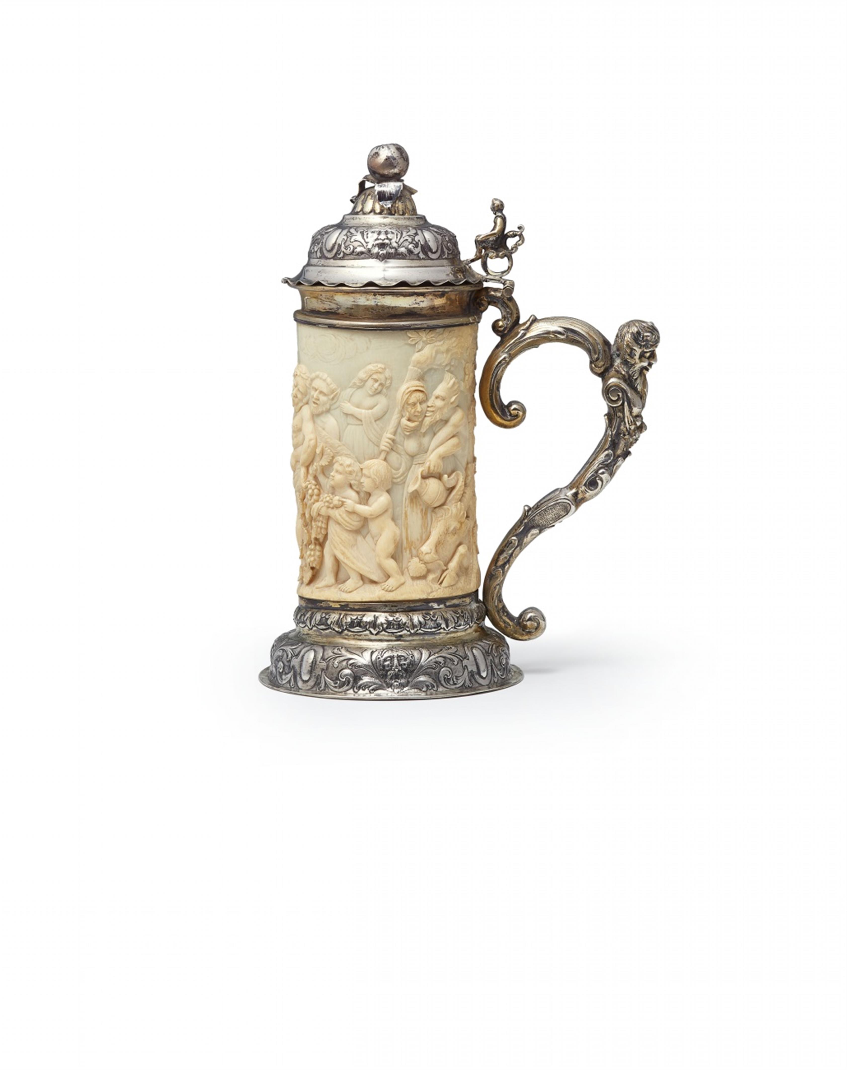 A German parcel gilt silver-mounted carved ivory tankard - image-1