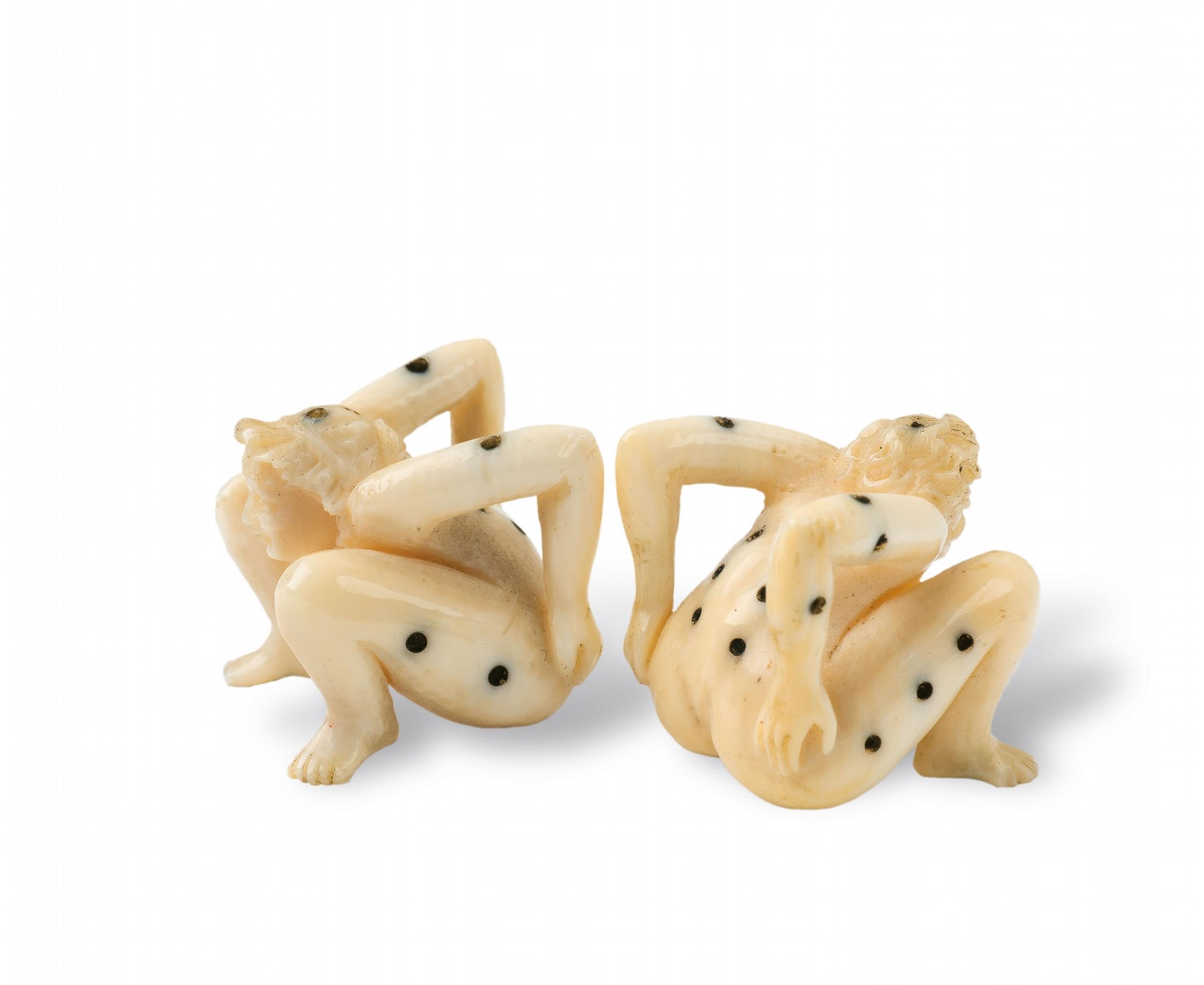 A pair of erotic carved ivory dice - image-1