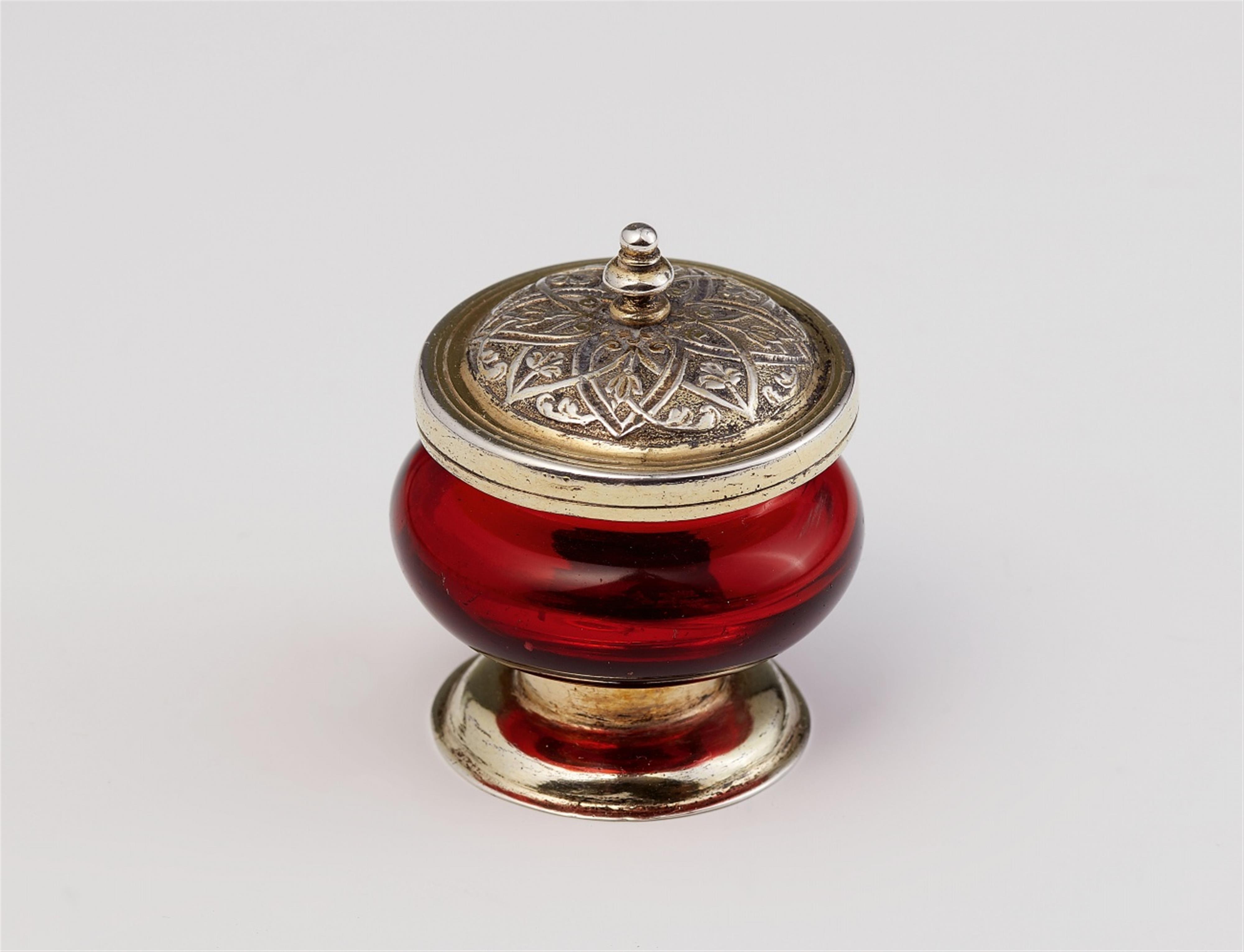 A small silver-gilt mounted ruby glass box - image-1