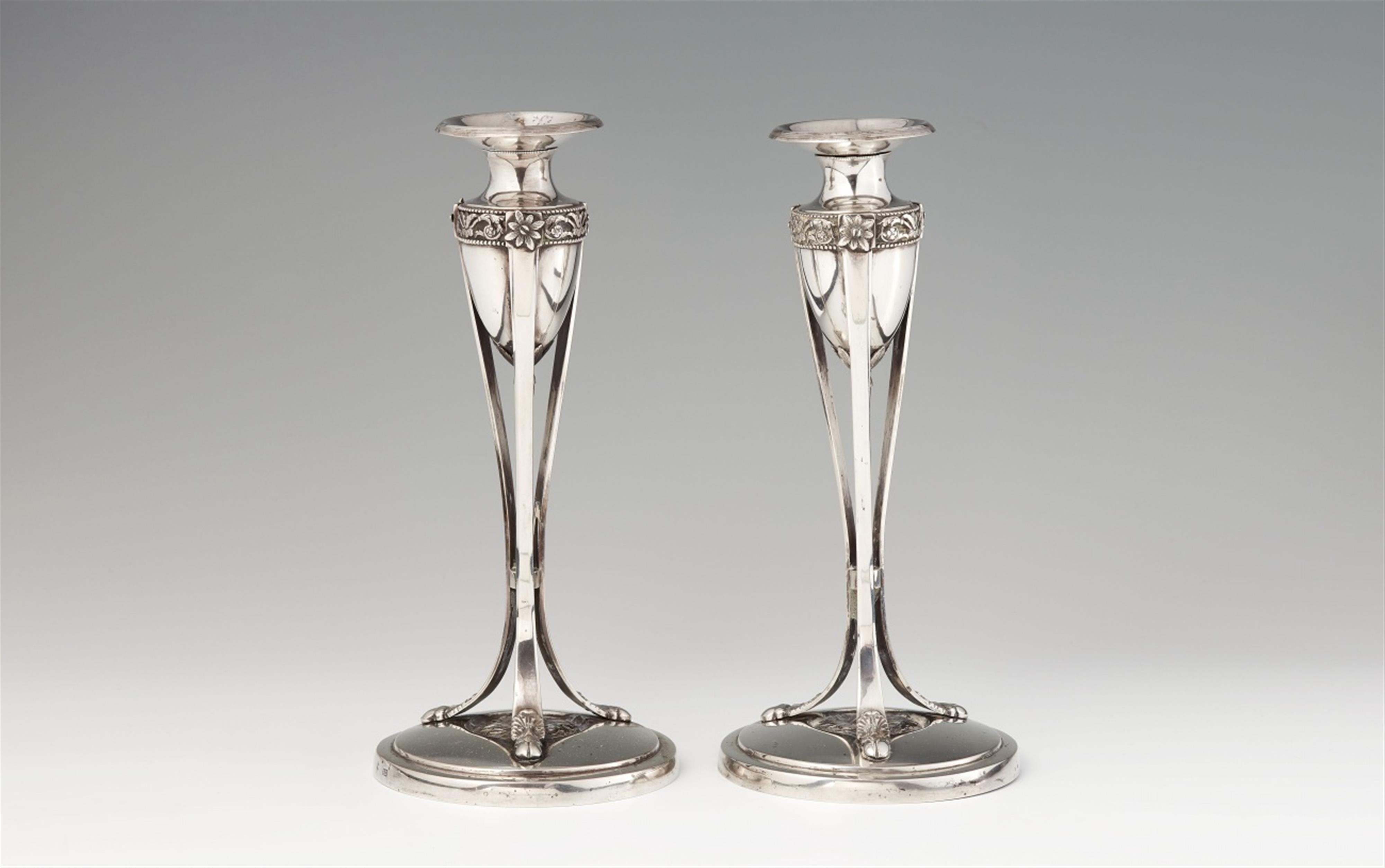 A pair of Münster Empire silver candlesticks - image-1