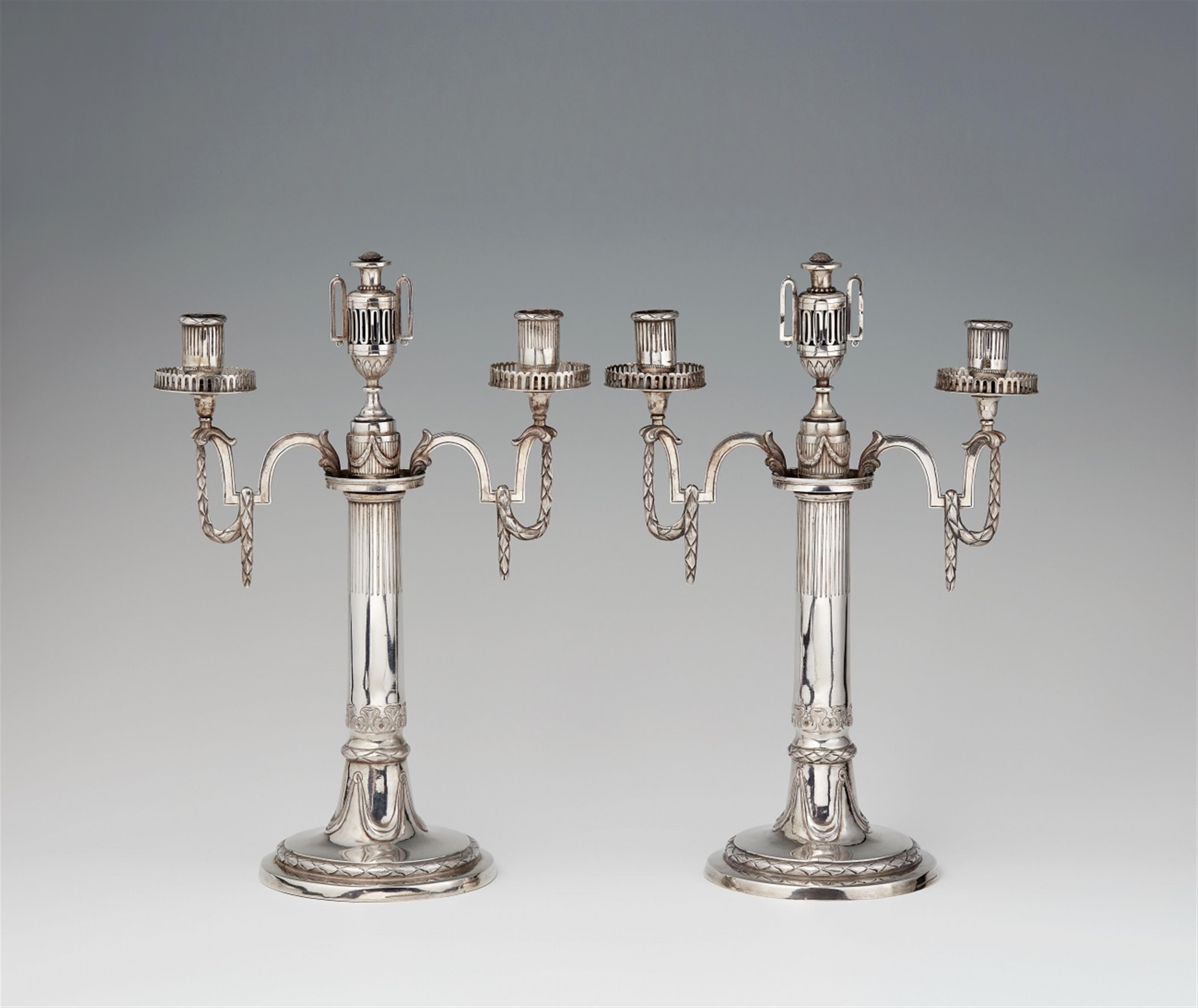 A pair of Louis XVI silver girandoles - image-1