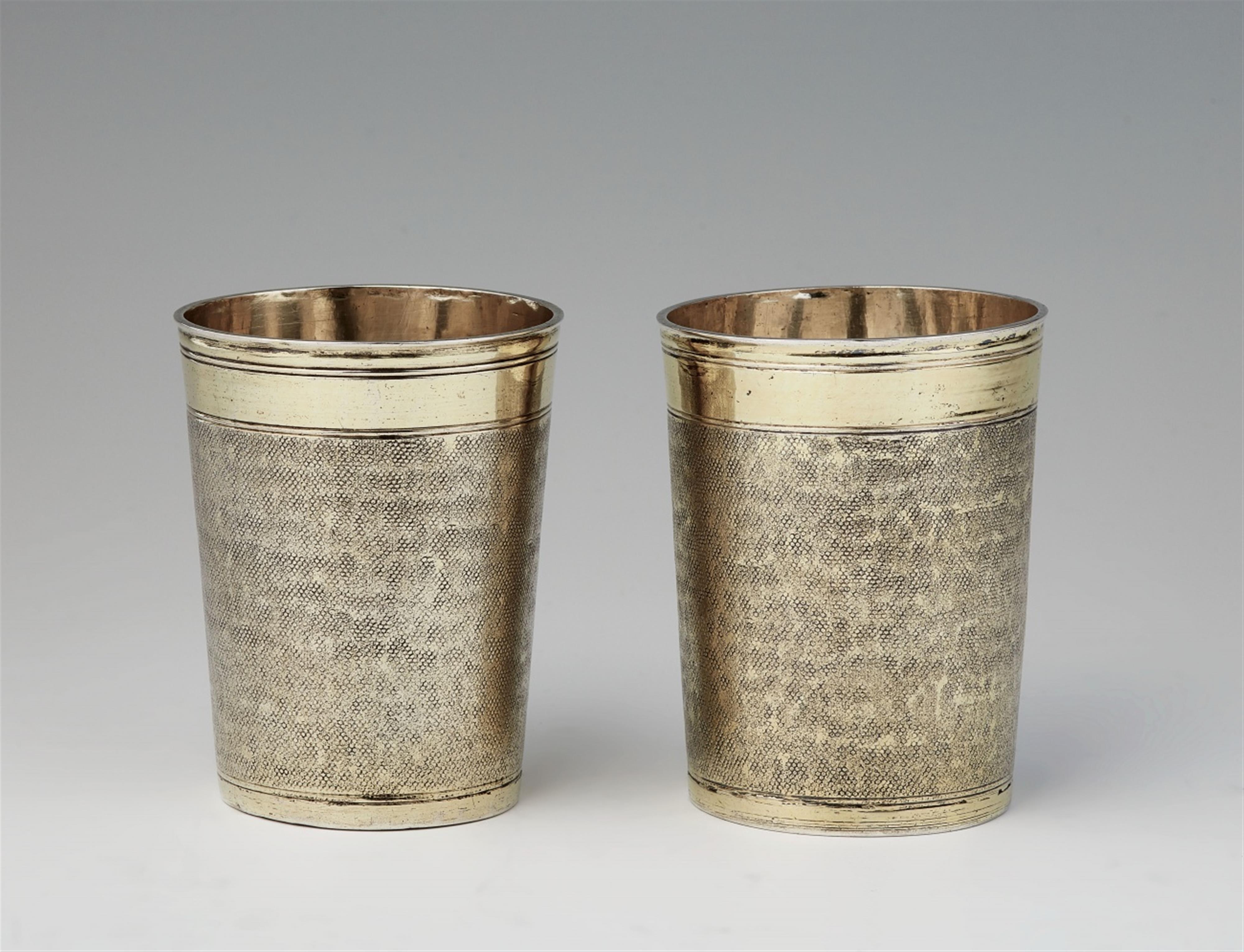 A pair of Nuremberg silver gilt snakeskin beakers - image-1