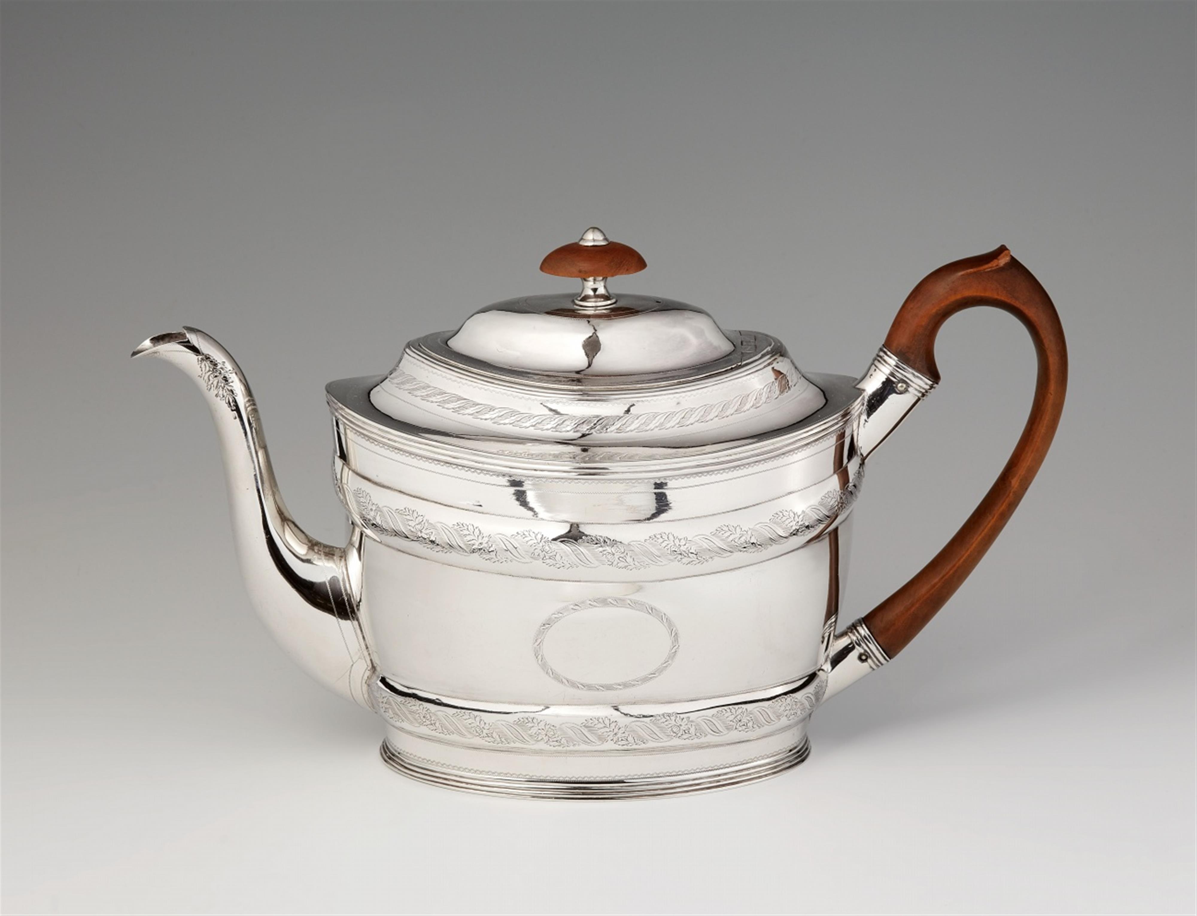 A George III silver teapot - image-1