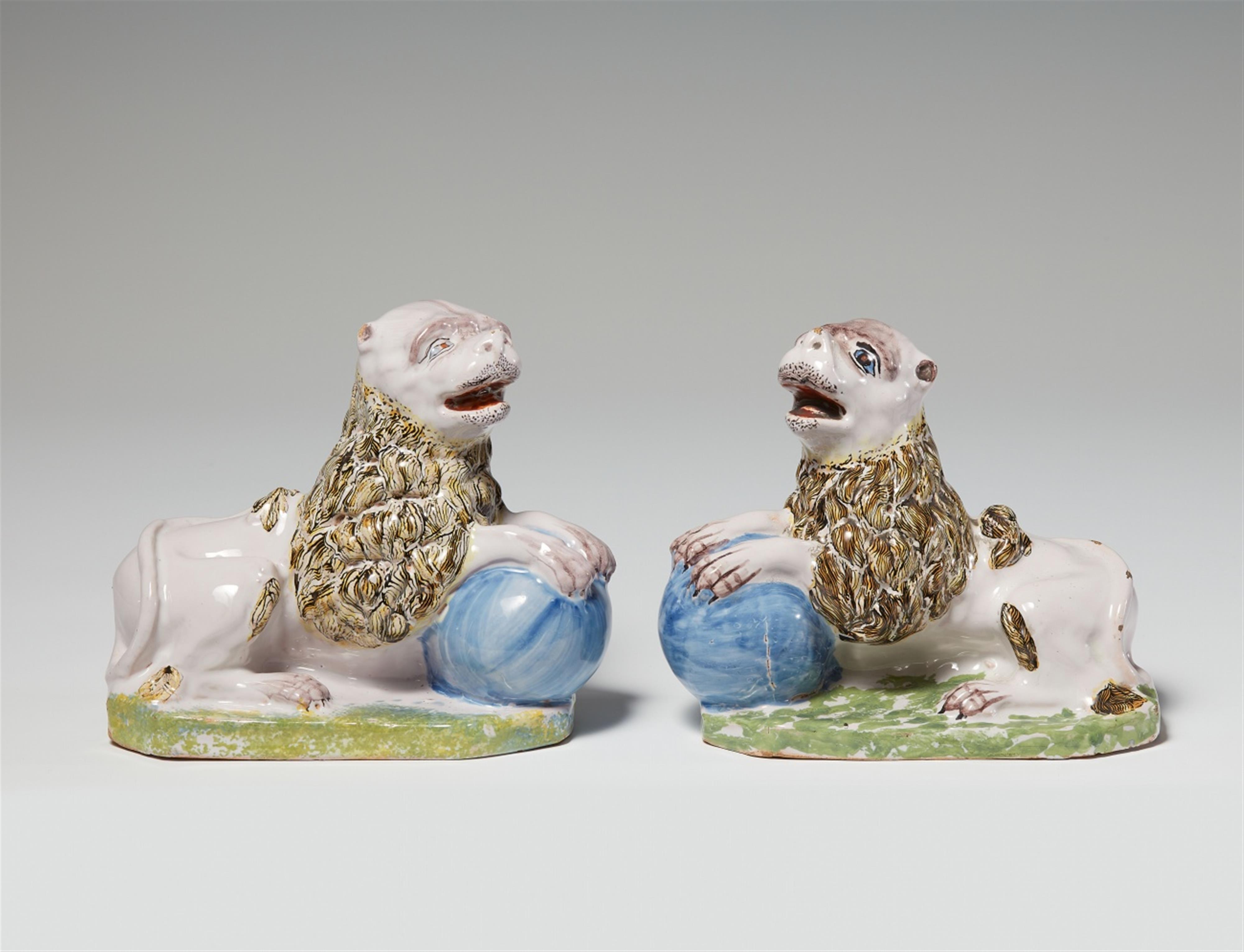 A pair of faience lions - image-1