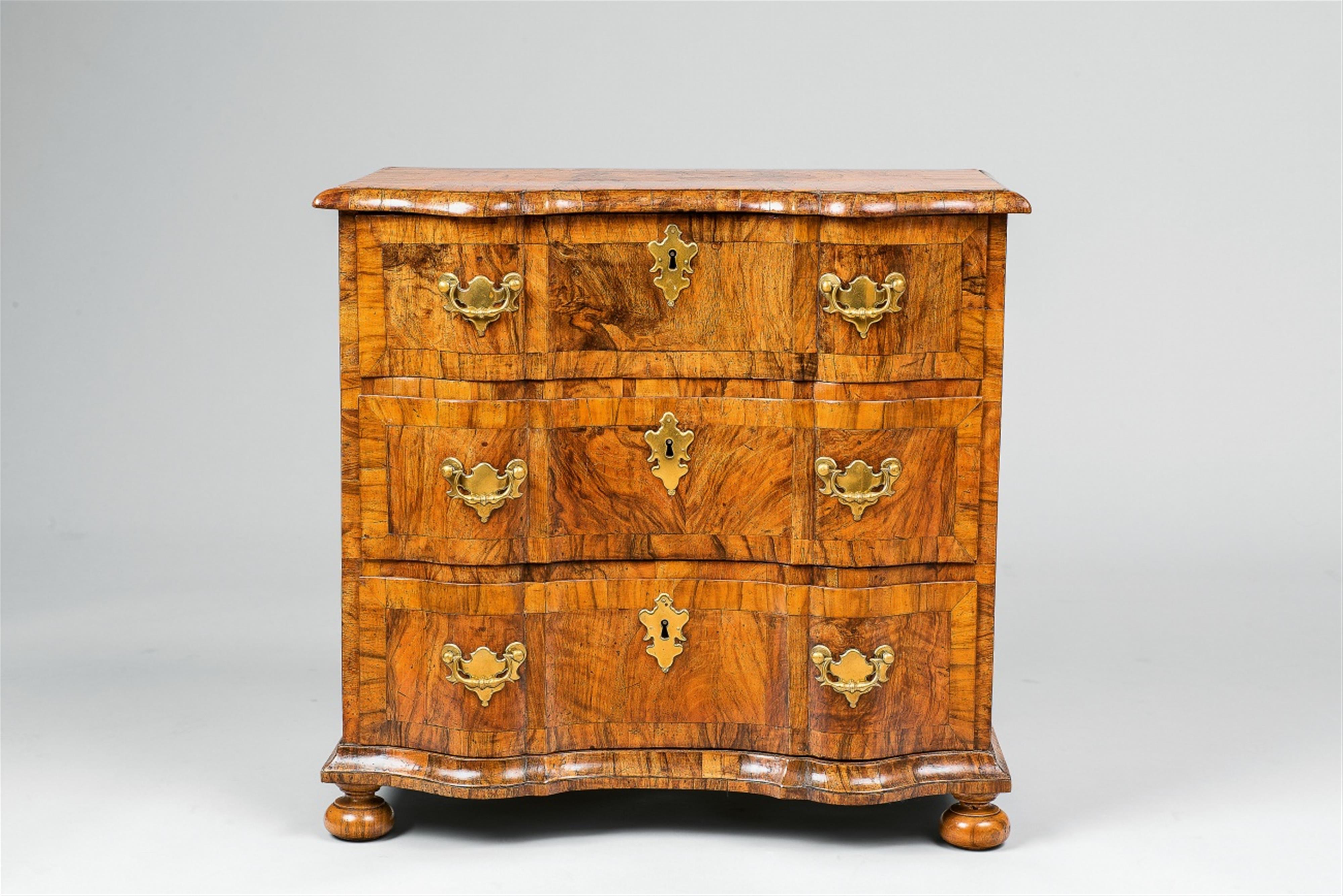 A small Central German walnut chest of drawers - image-1