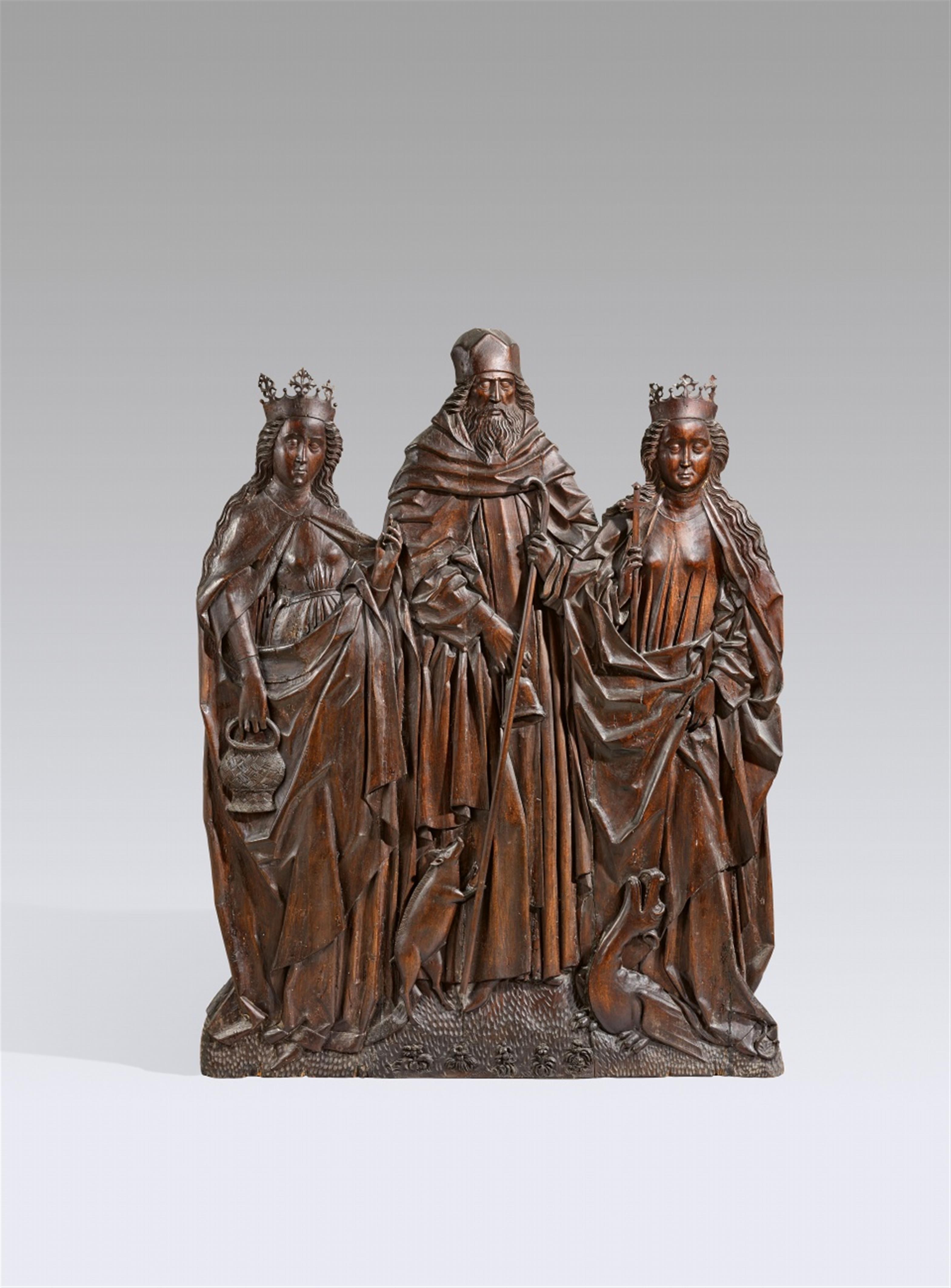 Probably Franconia 2nd half 15th century - Carved wood relief of Saint Dorothy, Anthony, and Margaret, probably Franconian, 2nd half 15th century - image-1