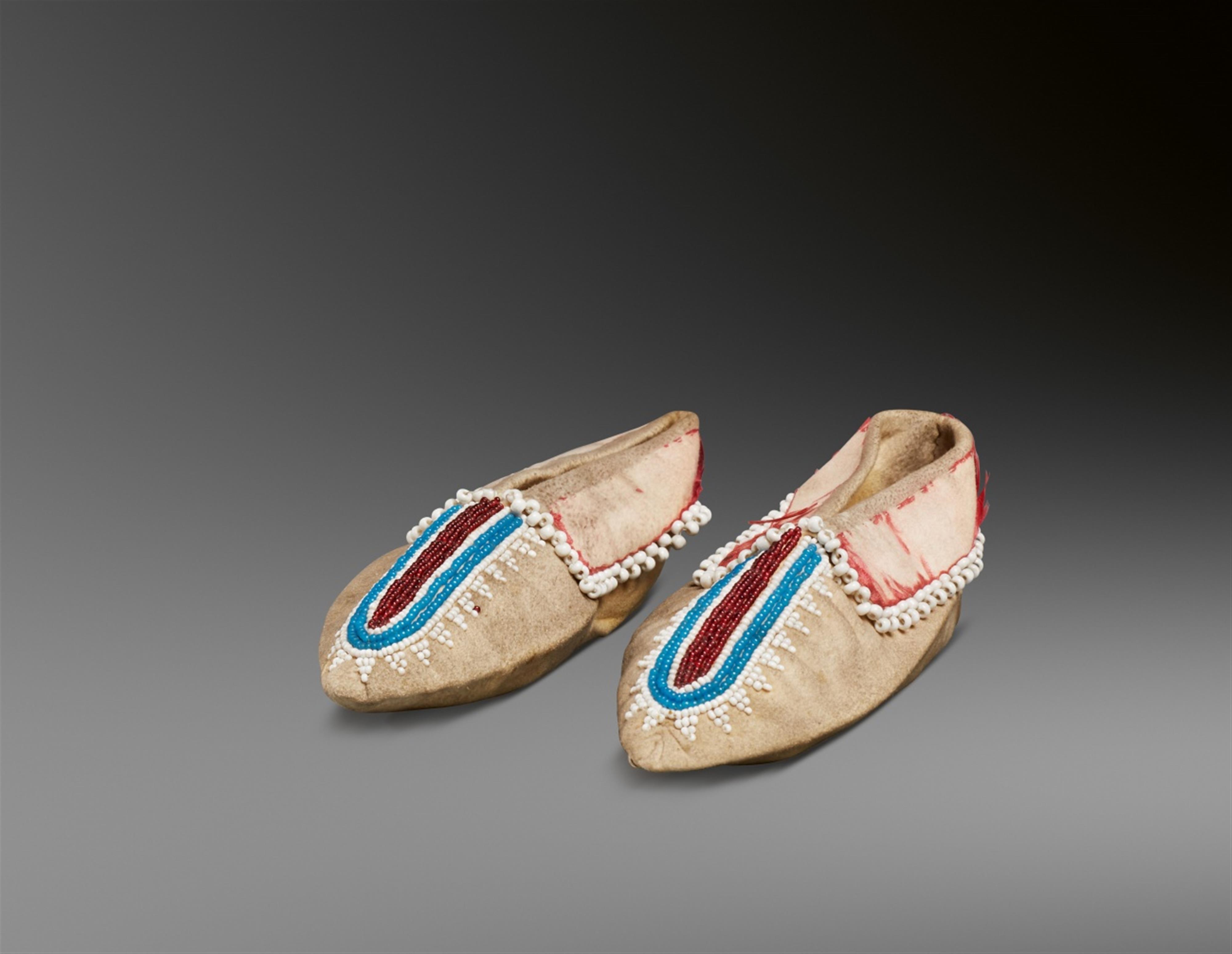 PAIR OF IROQUOIS CHILD'S BEADED MOCCASINS - image-1