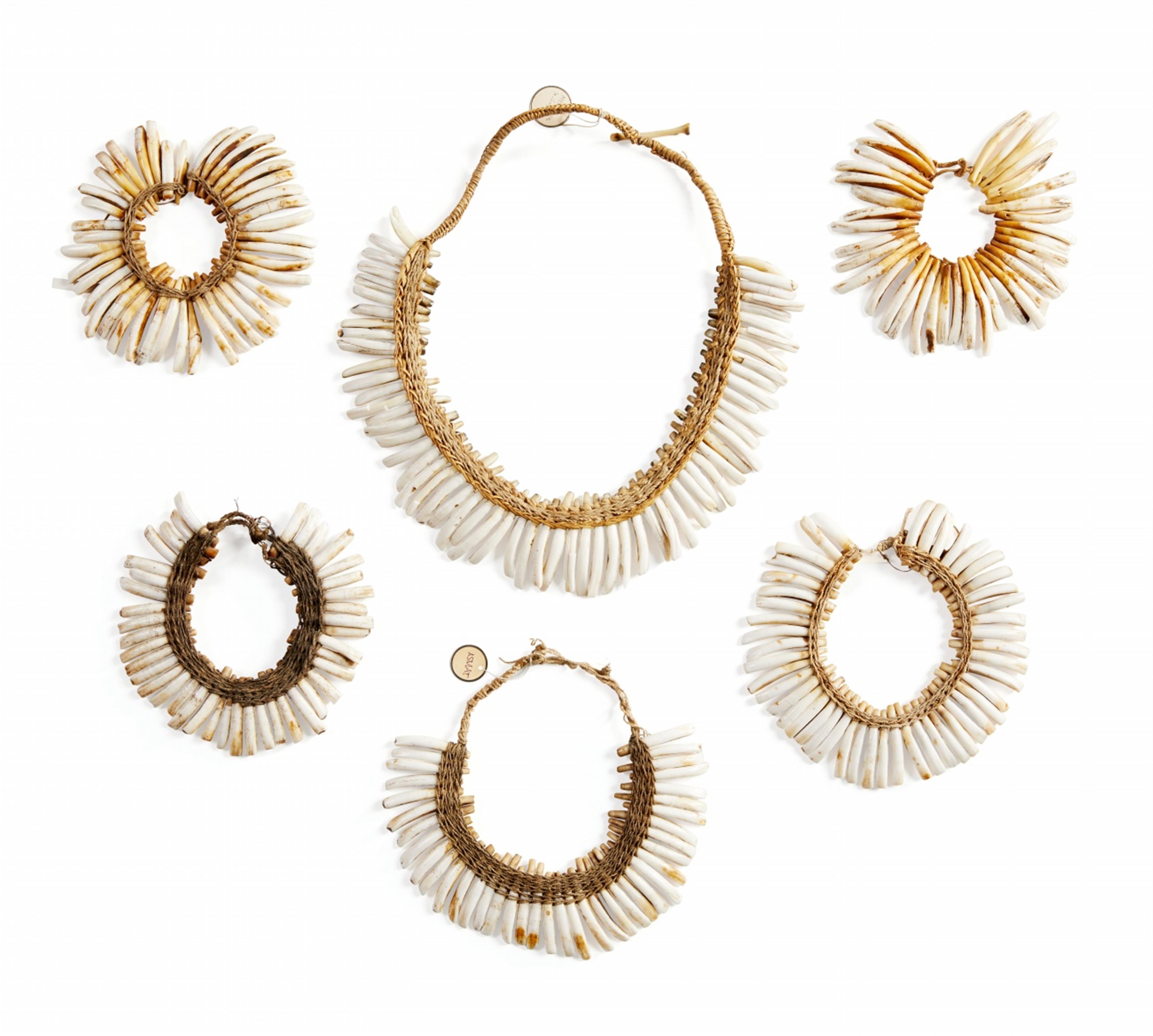 FIVE ASMAT PIG'S TOOTH NECKLACES - image-1