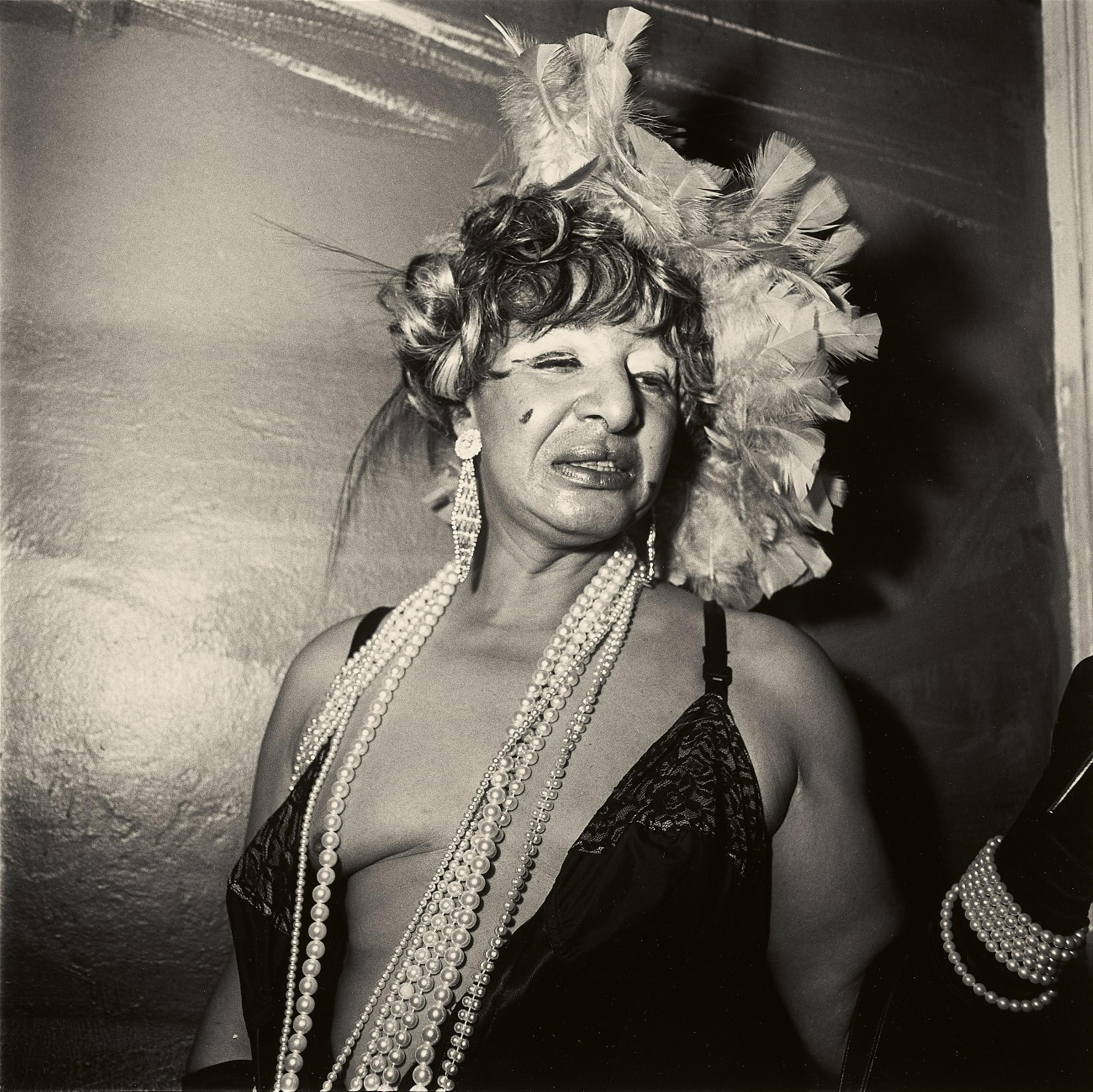 Diane Arbus - Transvestite at a Drag Ball, New York City - image-1