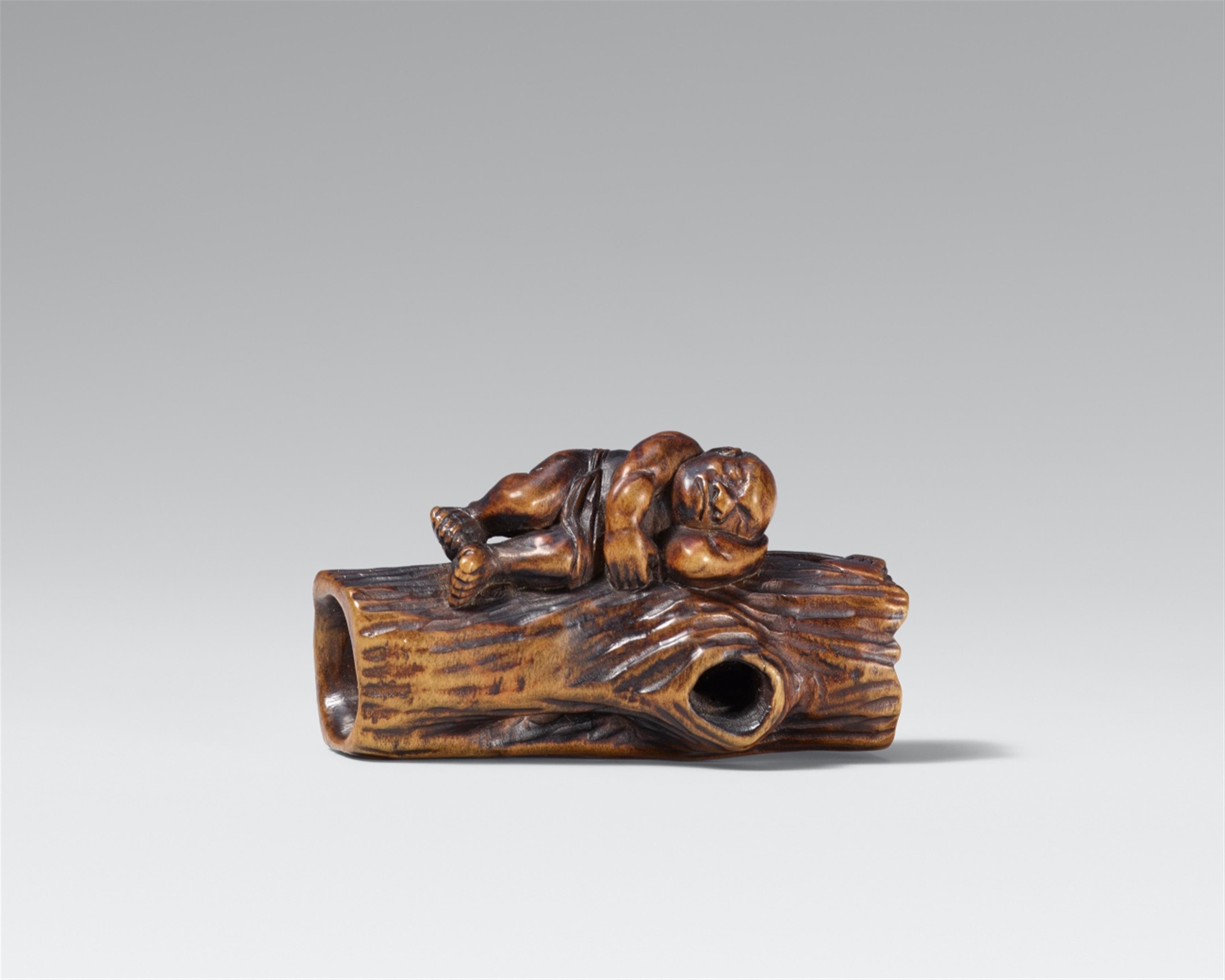 A boxwood netsuke of a sleeping woodcutter. Mid-19th century - image-1