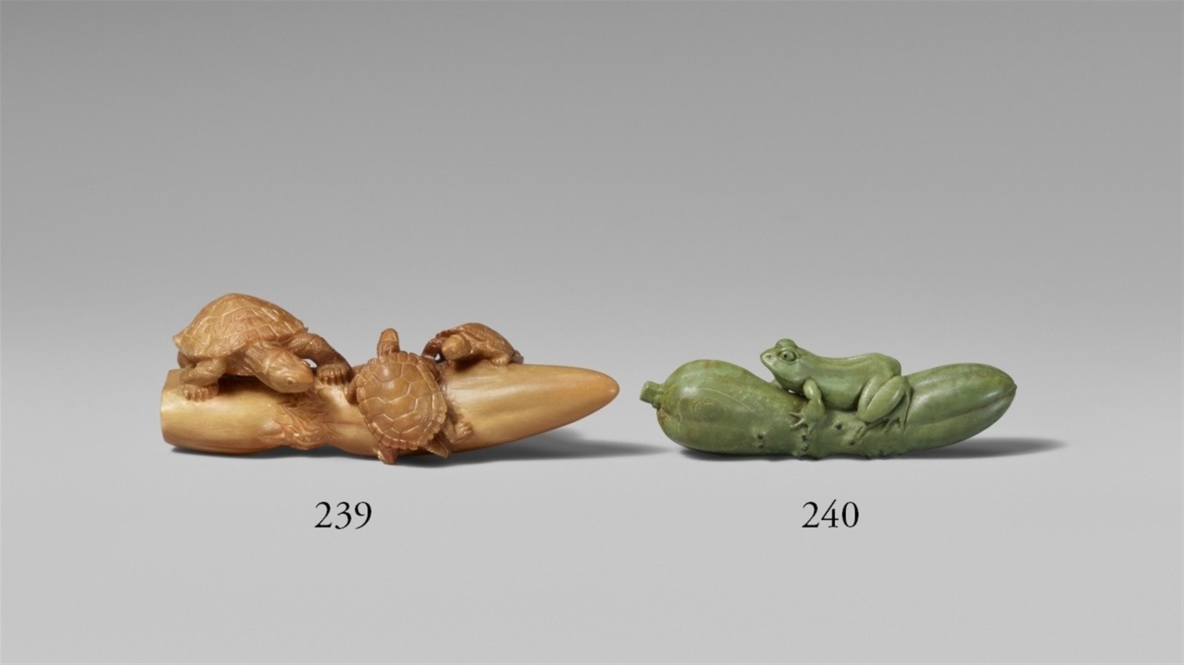 A green-stained ivory netsuke of a frog sitting on a cucumber. Second half 19th century - image-1