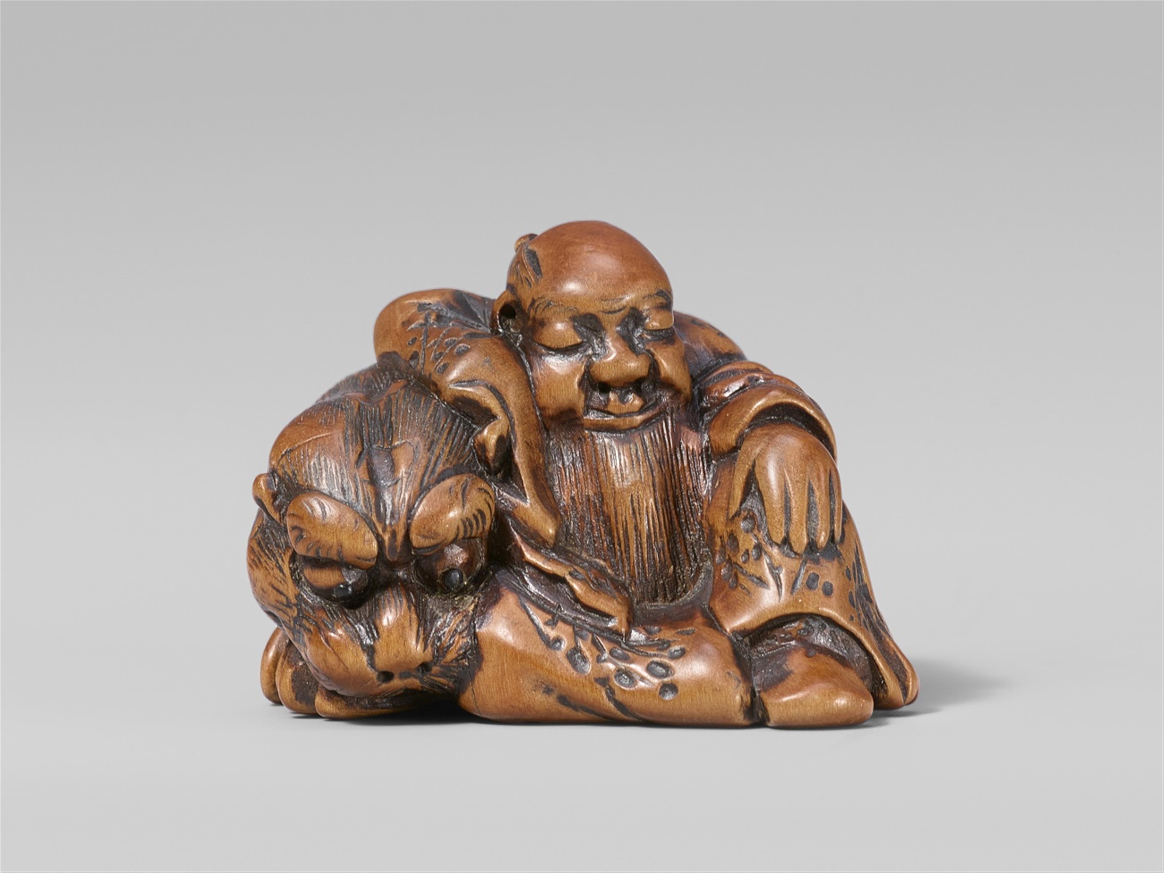 A charming boxwood netsuke possibly of Bunkan Zenshi. Early 19th century - image-1