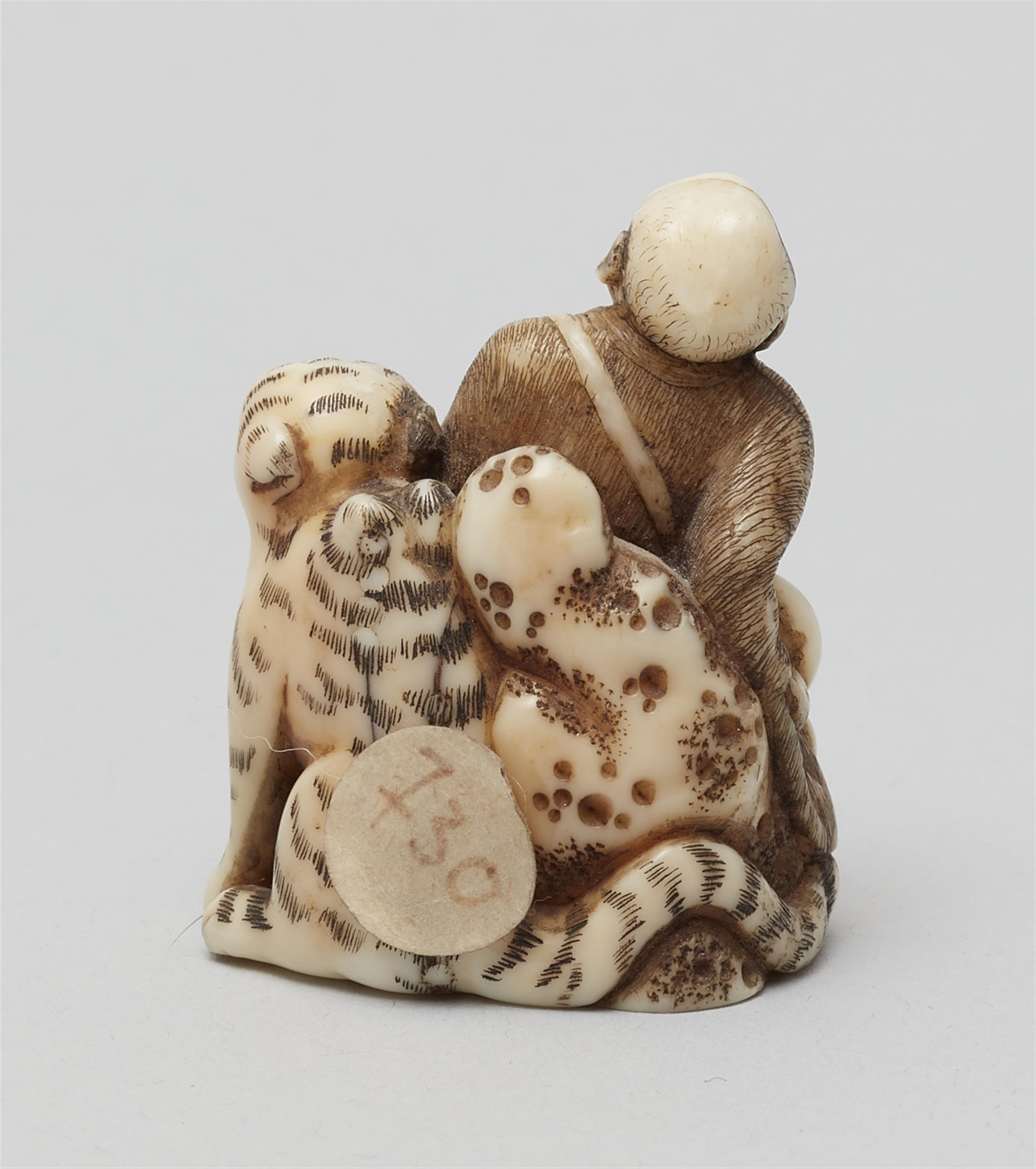 A walrus tusk netsuke of Bunkan Zenshi. Second half 19th century - image-3