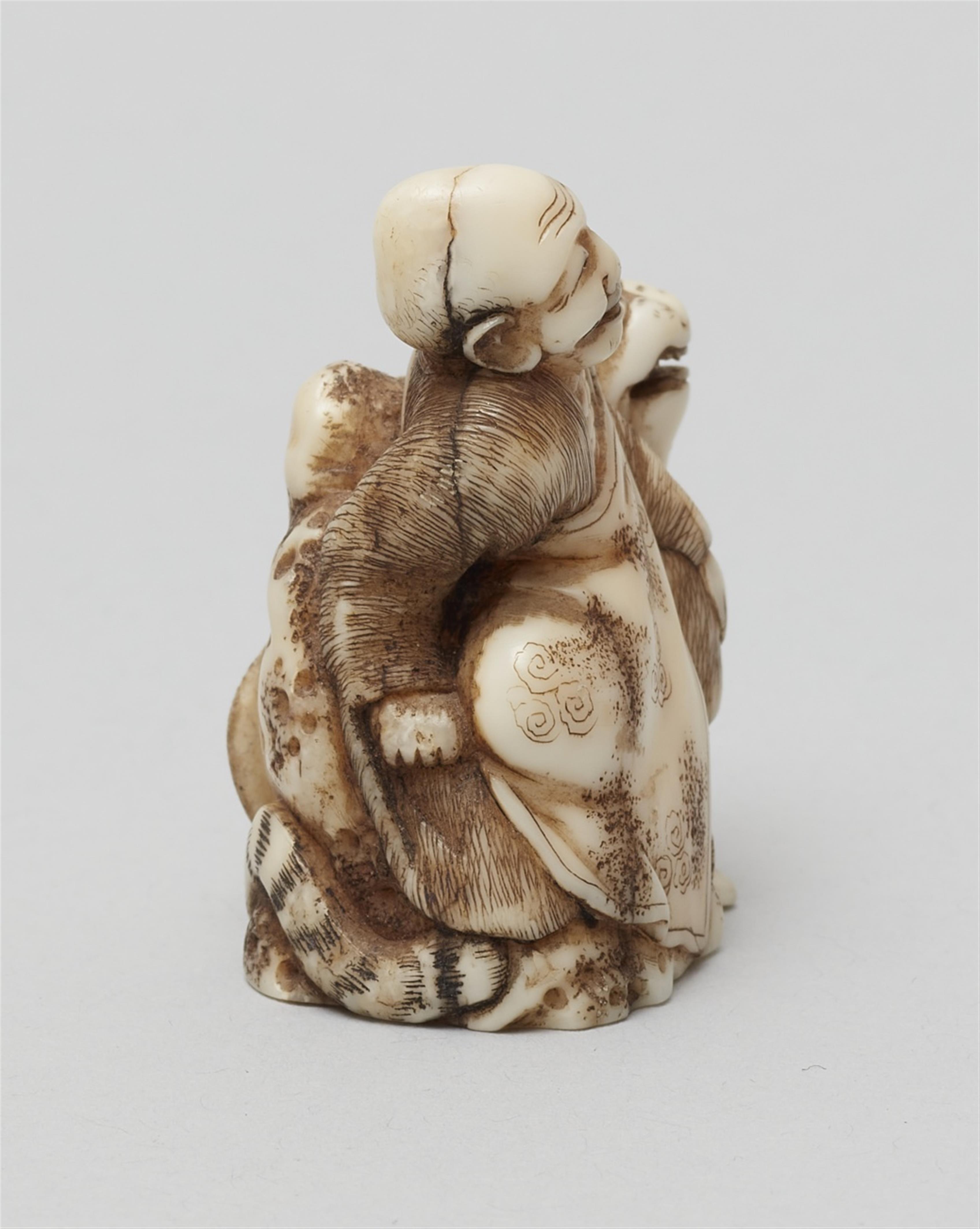 A walrus tusk netsuke of Bunkan Zenshi. Second half 19th century - image-4