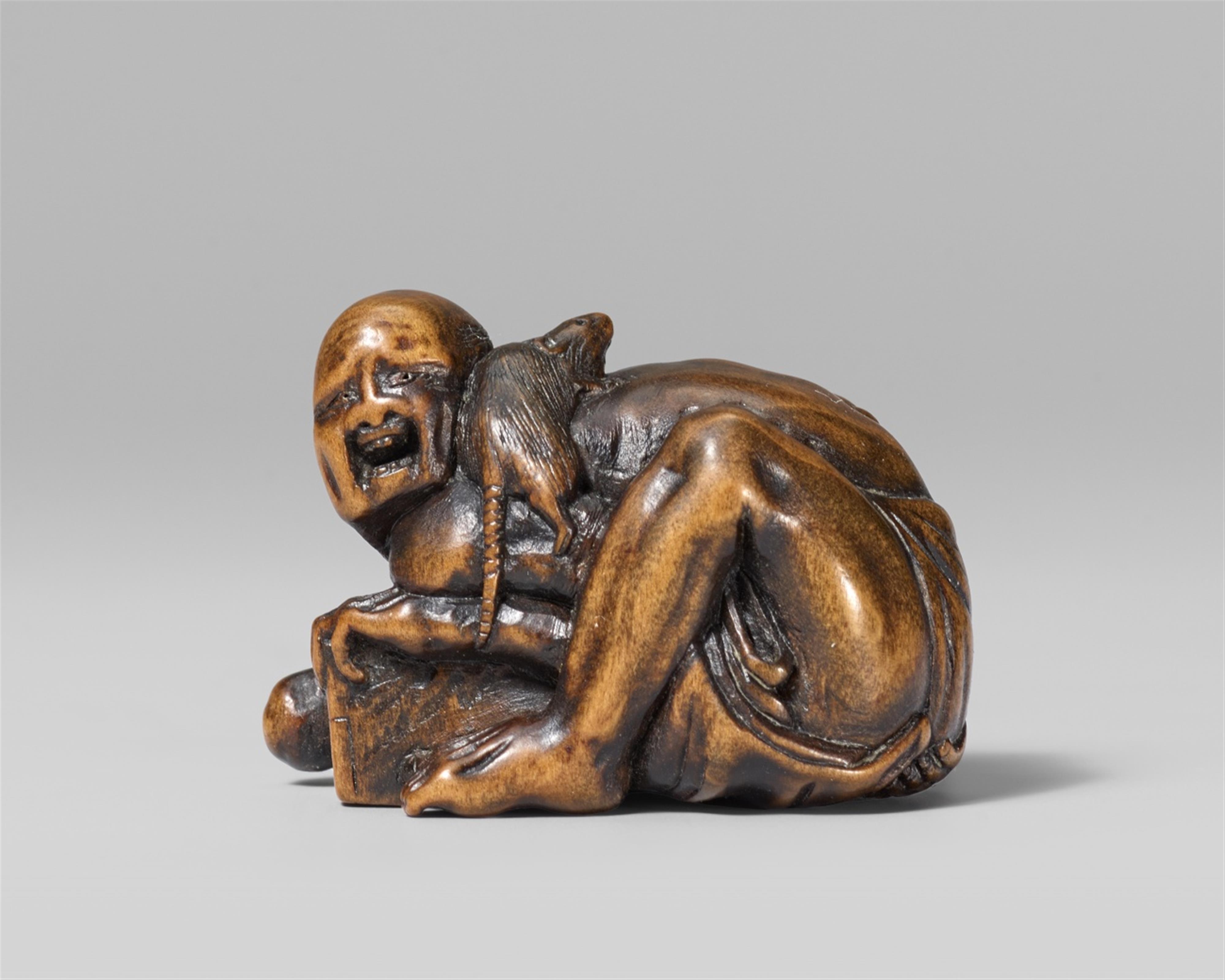 A small boxwood netsuke of a disappointed rat catcher, by Ichimin. Mid-19th century - image-1