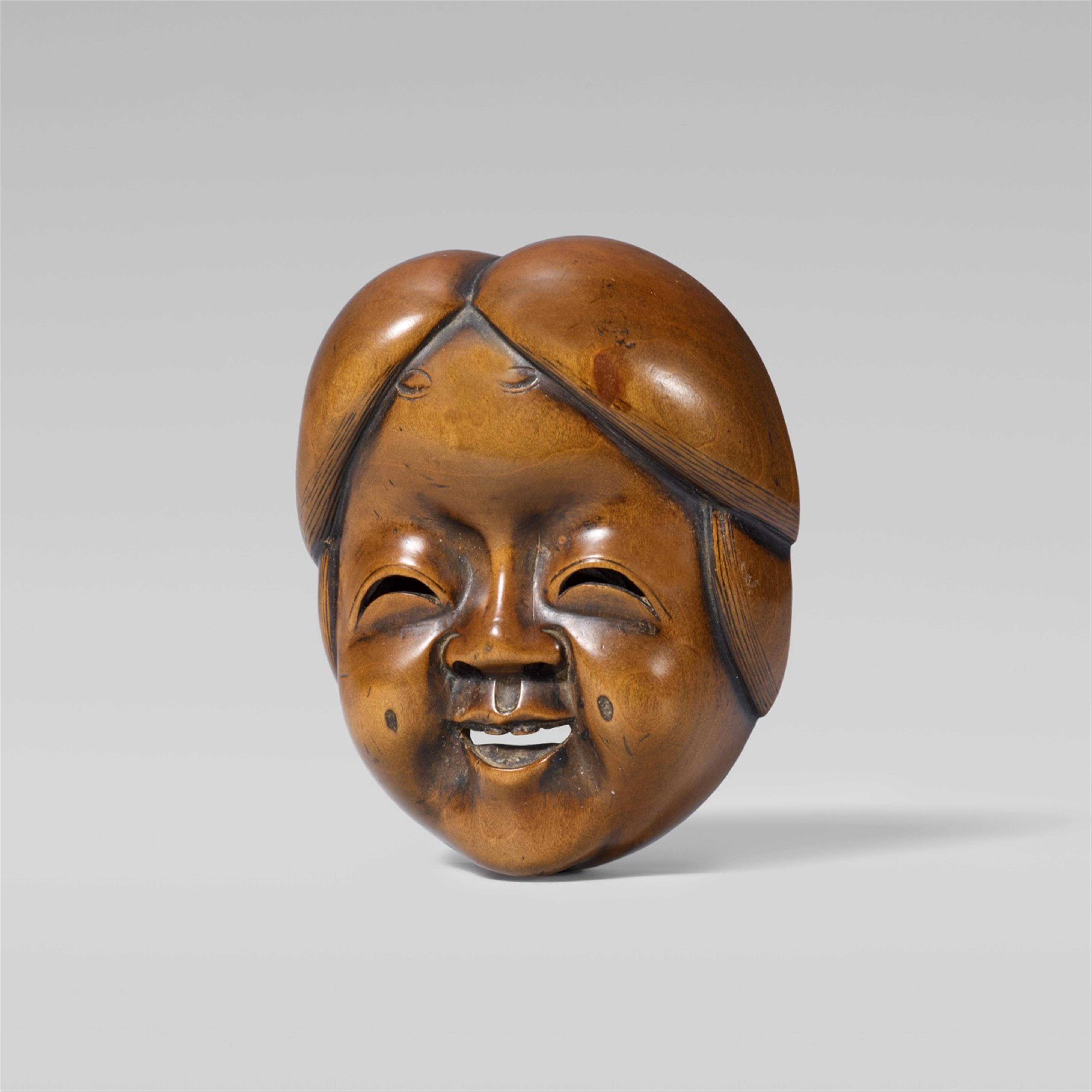 A very large and fine Edo school netsuke of an Okame mask, by Gyokkô. Mid-19th century - image-1