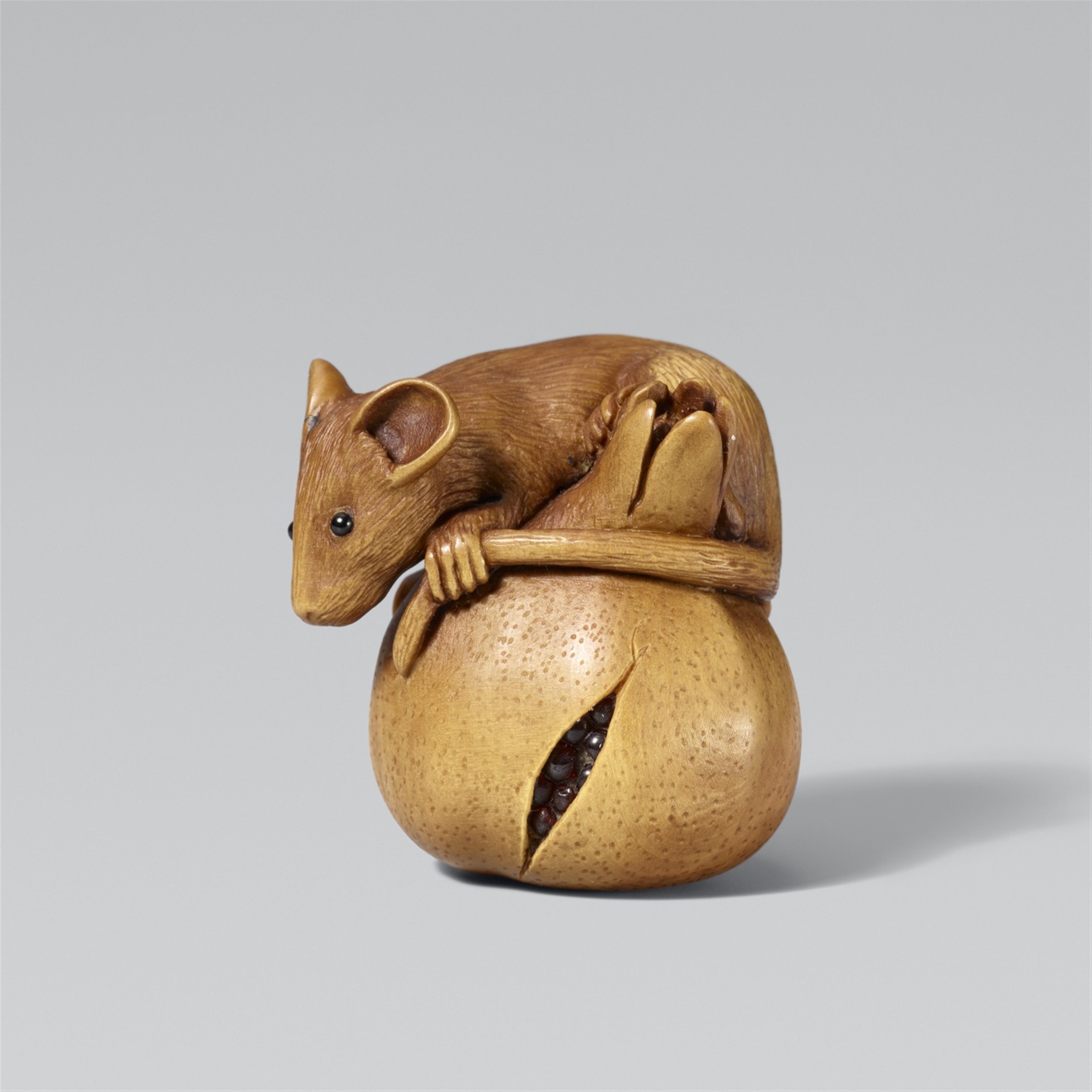 A boxwood netsuke of a rat on a pomegranate by Alexander Derkachenko - image-1