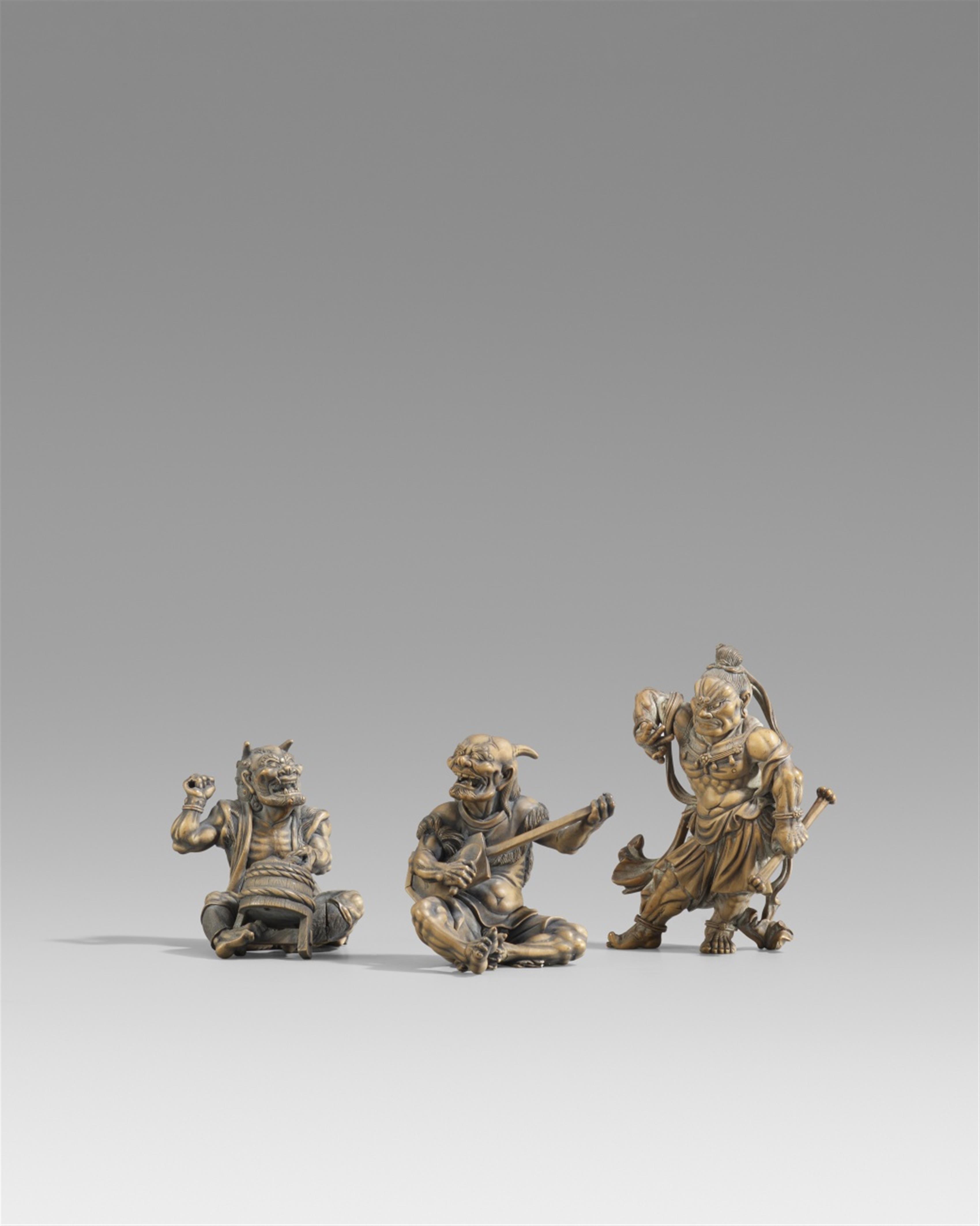 Three boxwood okimono of a pair of oni and a Nio. Late 19th century - image-1