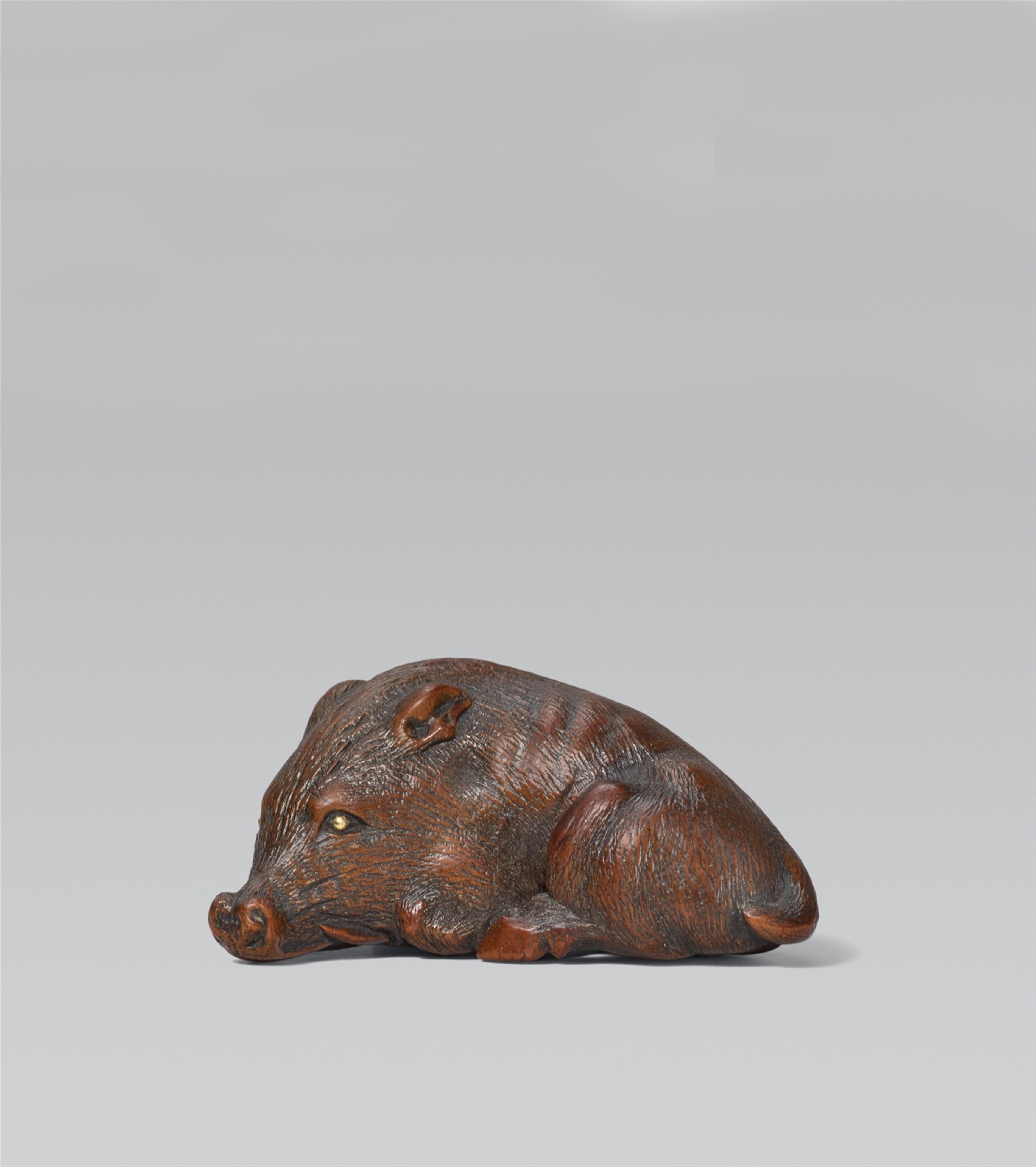 A reclining boar. Fruit wood. 19th century - image-1