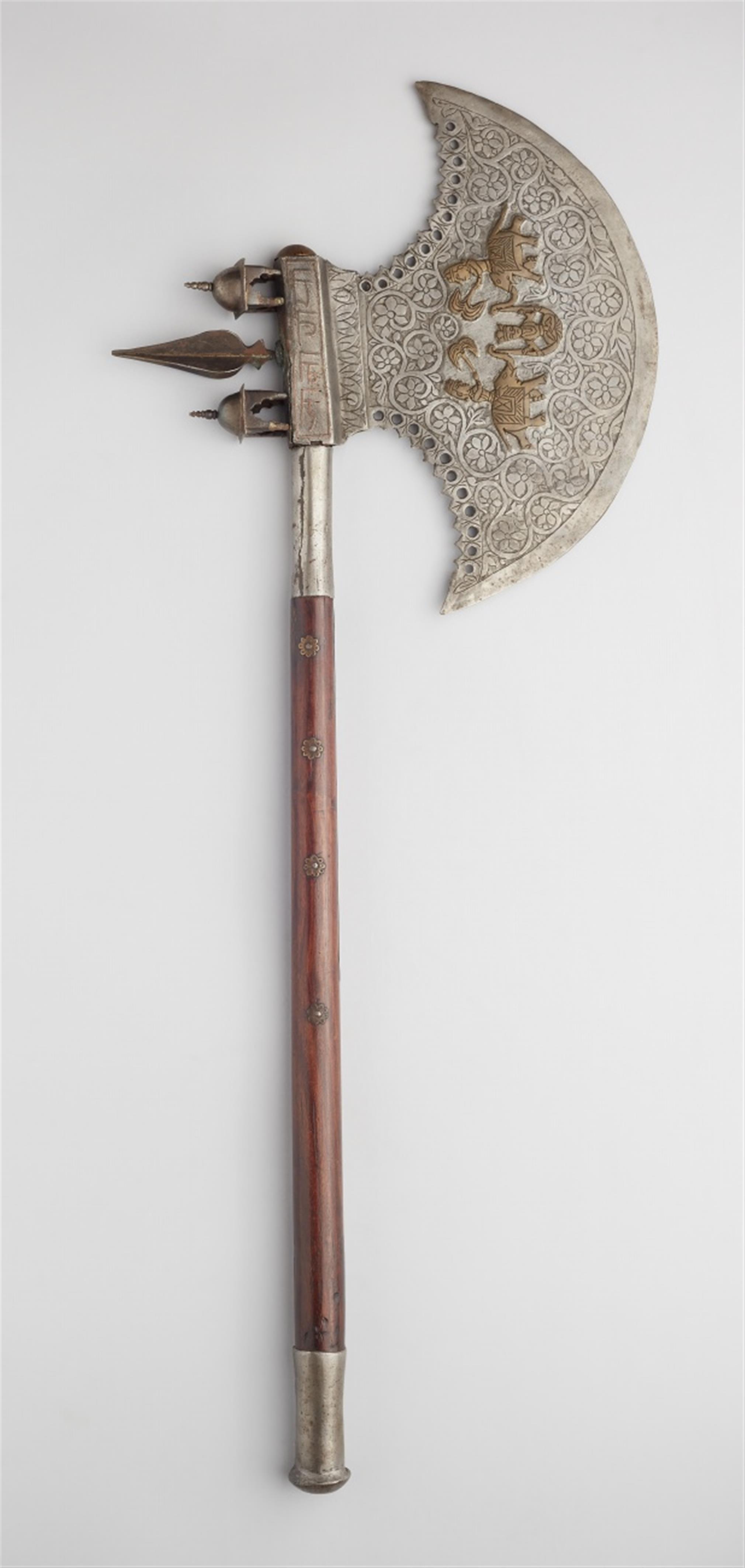 A Jaipur iron battle axe with a wooden shaft.19th century - image-1